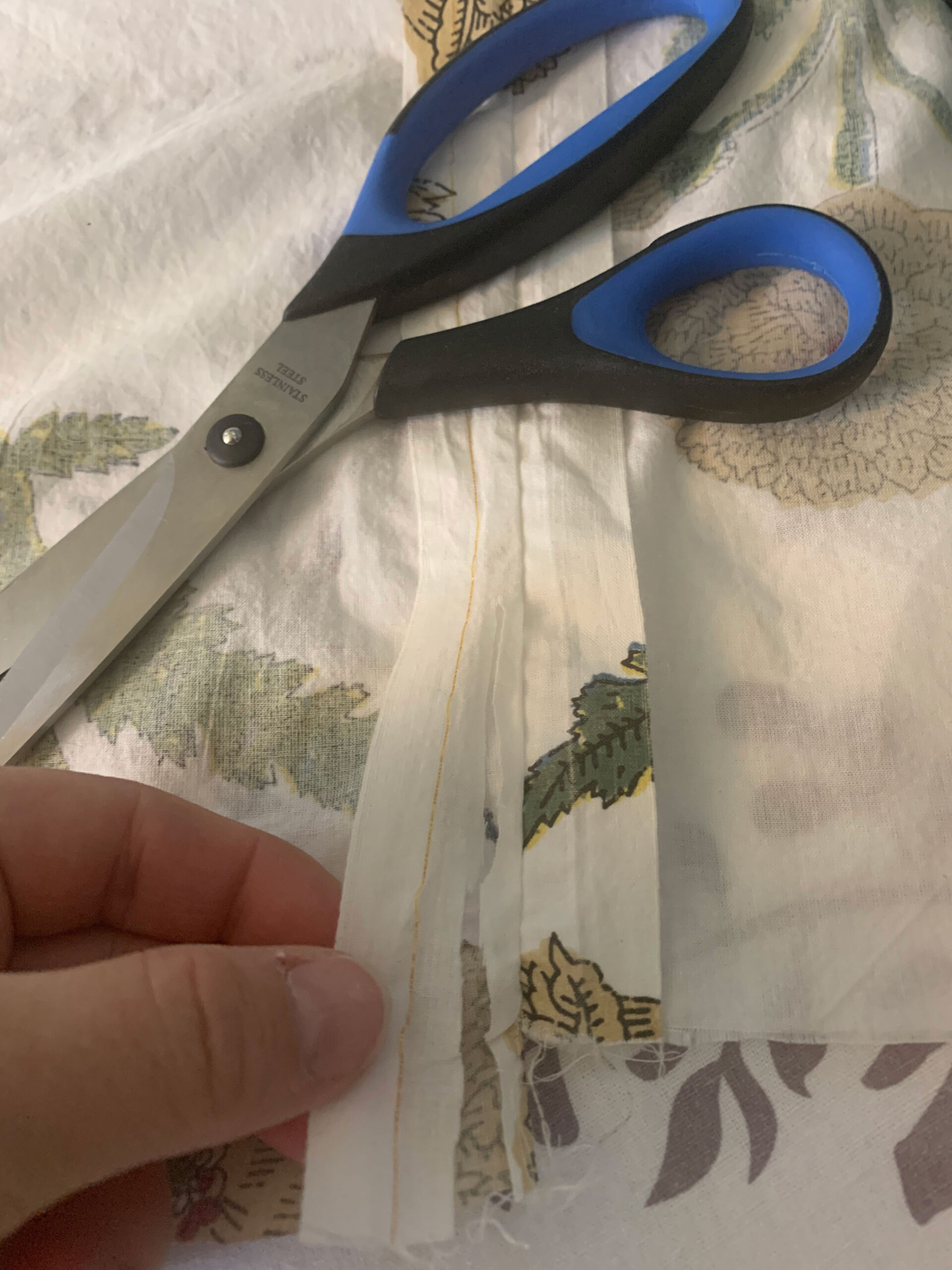 cutting one tail end of the back of a seam