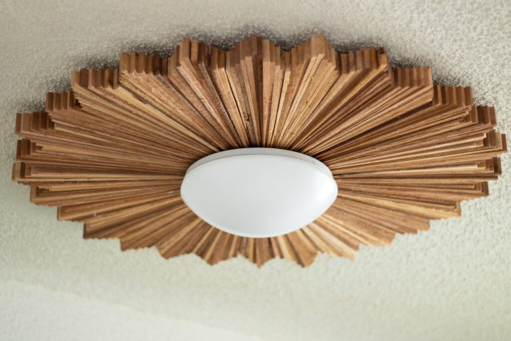 Cedar shim light fixture with LED flush-mount light installed on top