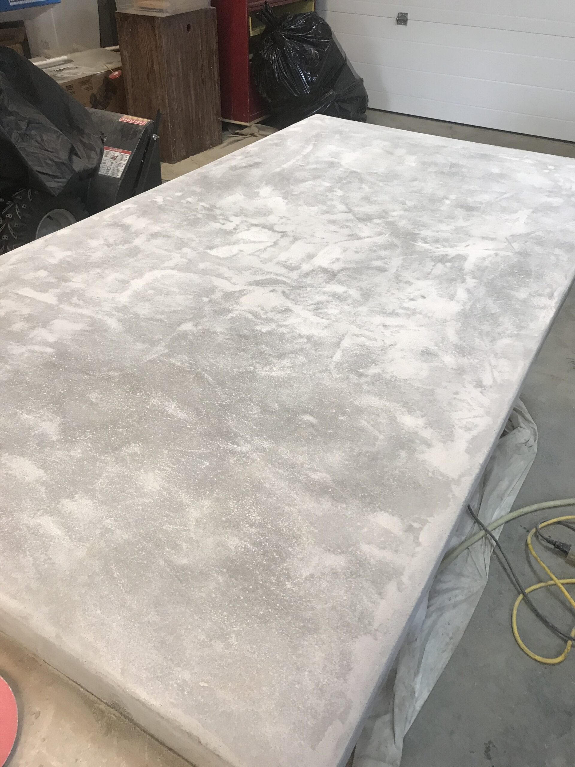 Concrete tabletop after more sanding