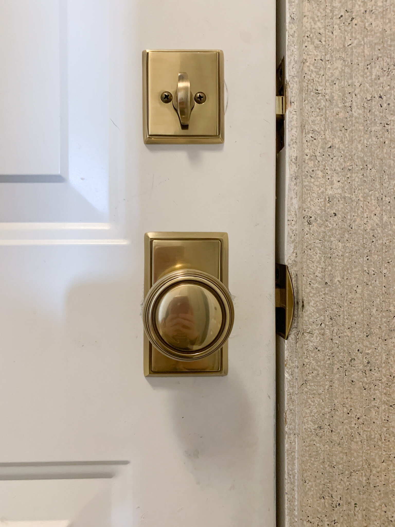 antique brass deadbolt and door knob from Emtek