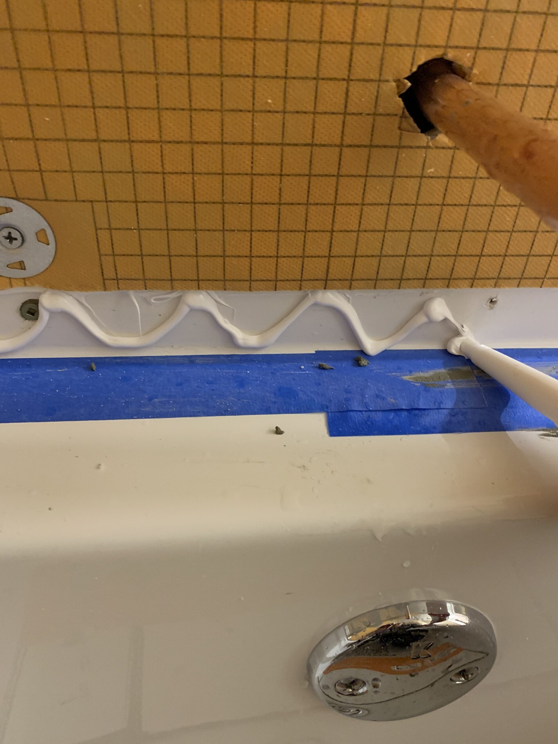 adding Kerdi Fix to the tub flange