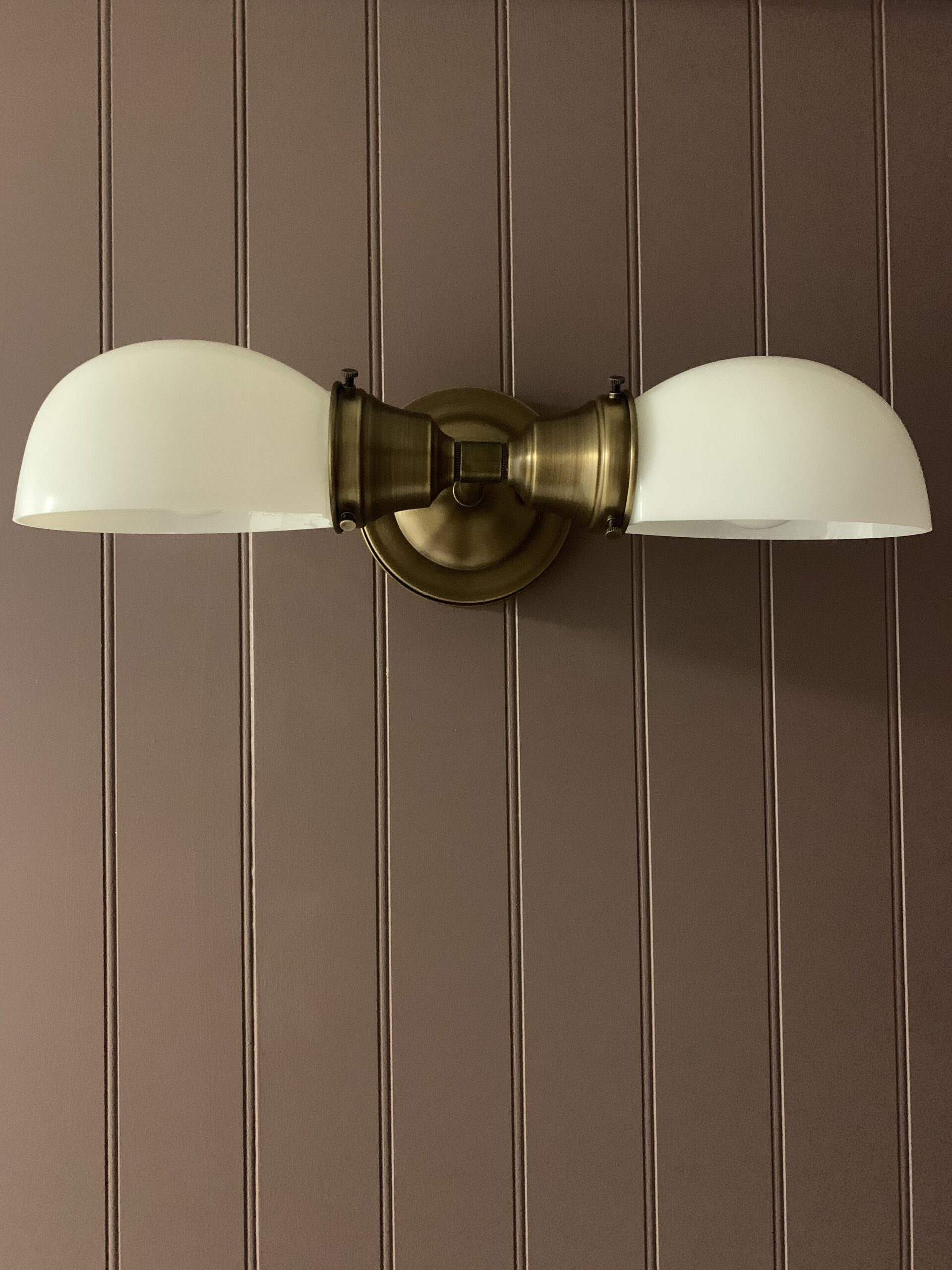 A handcrafted finish for raw brass wall light