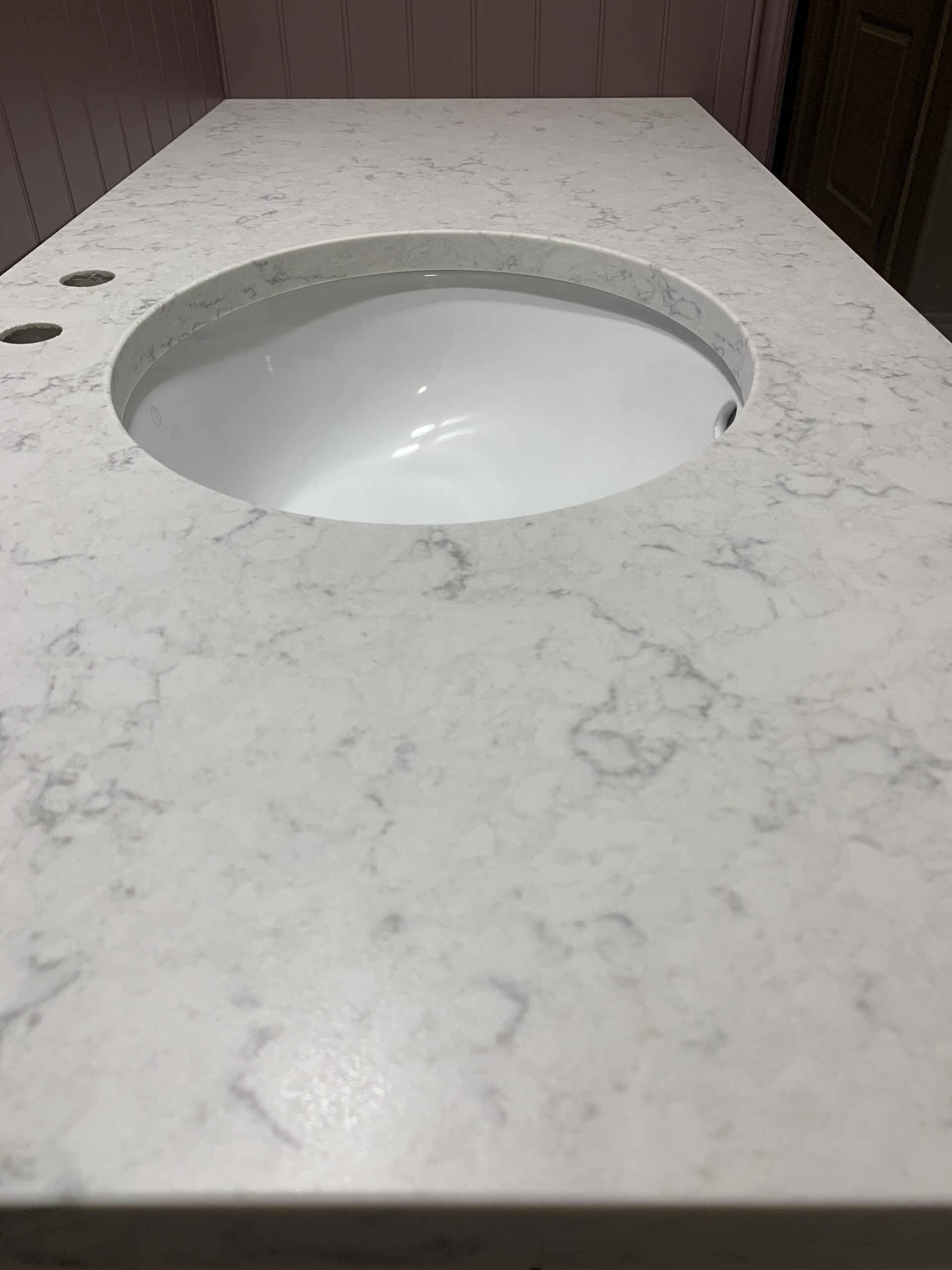 white quartz counter with white undermount sink