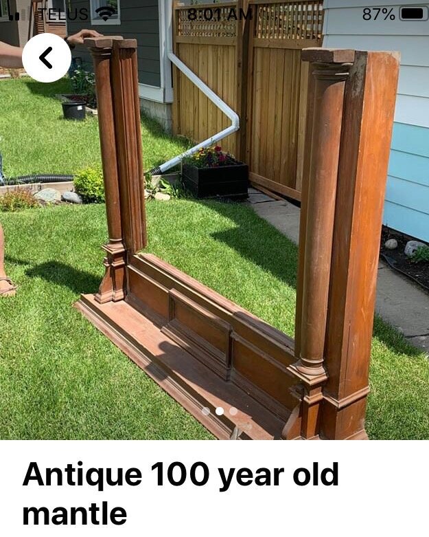 facebook marketplace ad for antique fireplace mantel being held upside down