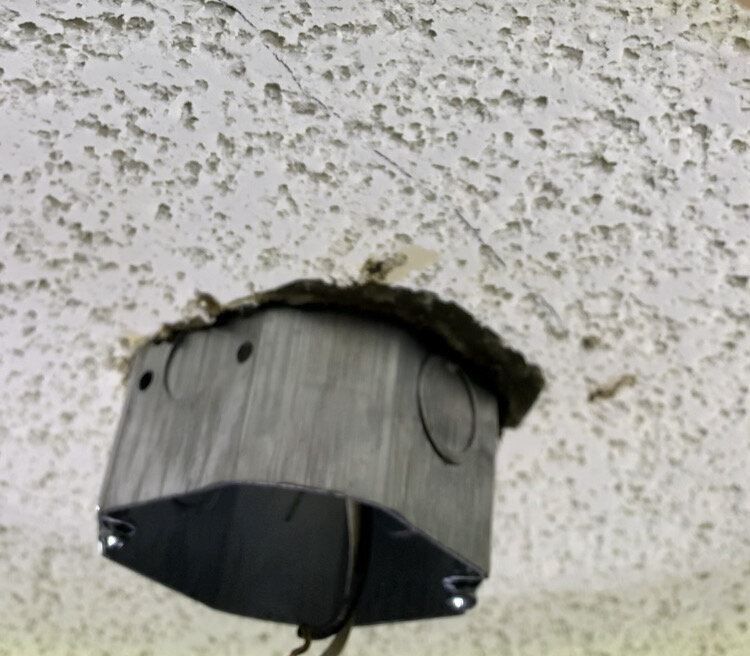 photo of a box extender sticking about 4" past ceiling