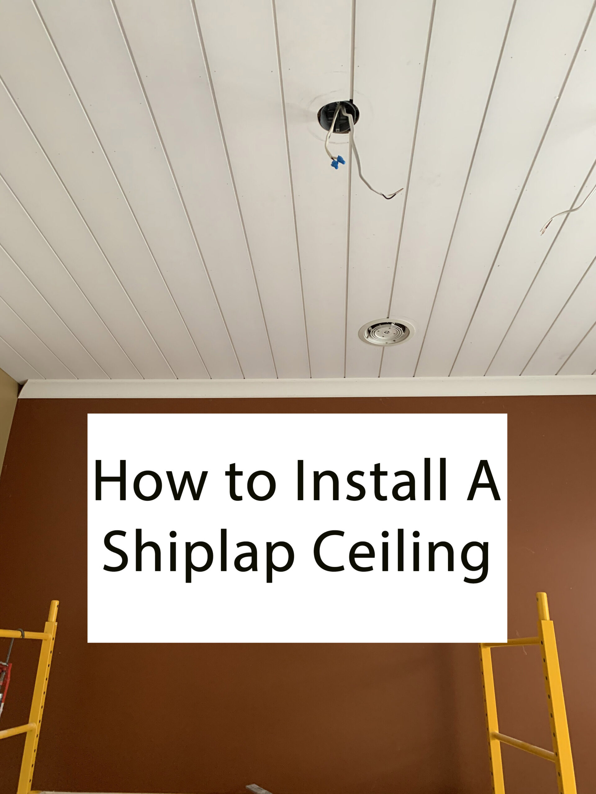 graphic reading "how to install a shiplap ceiling" with white shiplap ceiling and crown moulding and brown walls and scaffold