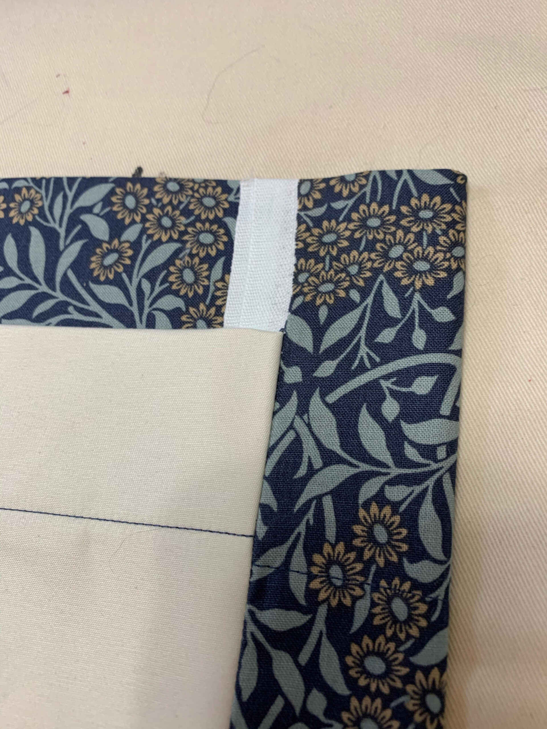 showing inside bottom edge of curtain fabric 