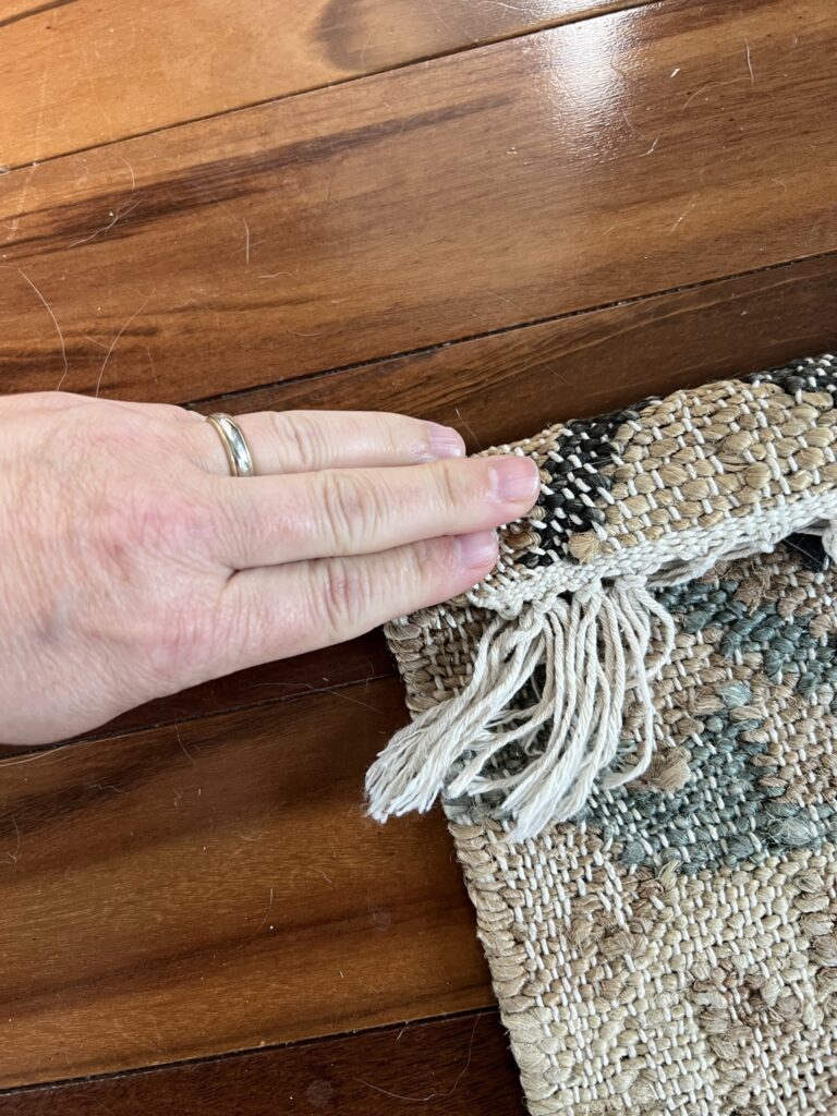 How to Hang a Rug over a TV - Erin Zubot Design