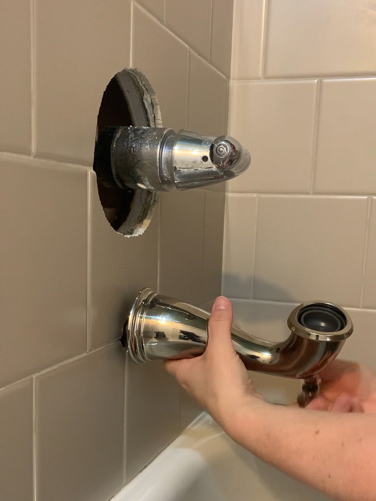 threading on a tub spout in a shower