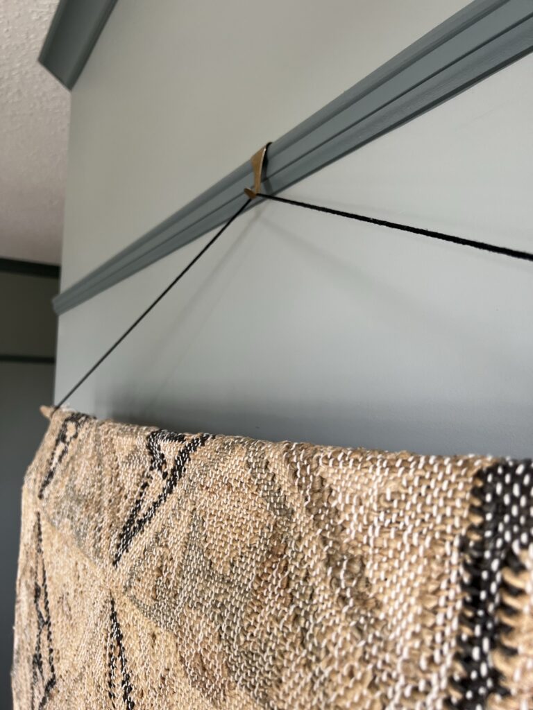 How to Hang a Rug over a TV - Erin Zubot Design