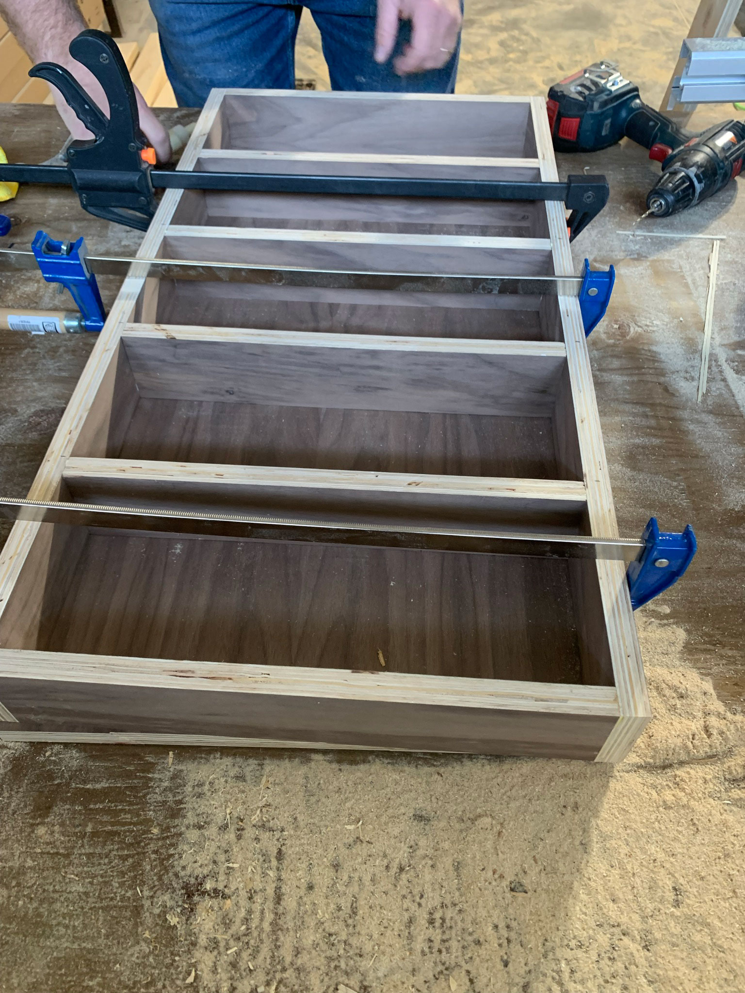 DIY Wood and Brass Spice Rack glued and clamped together with shelves inserted