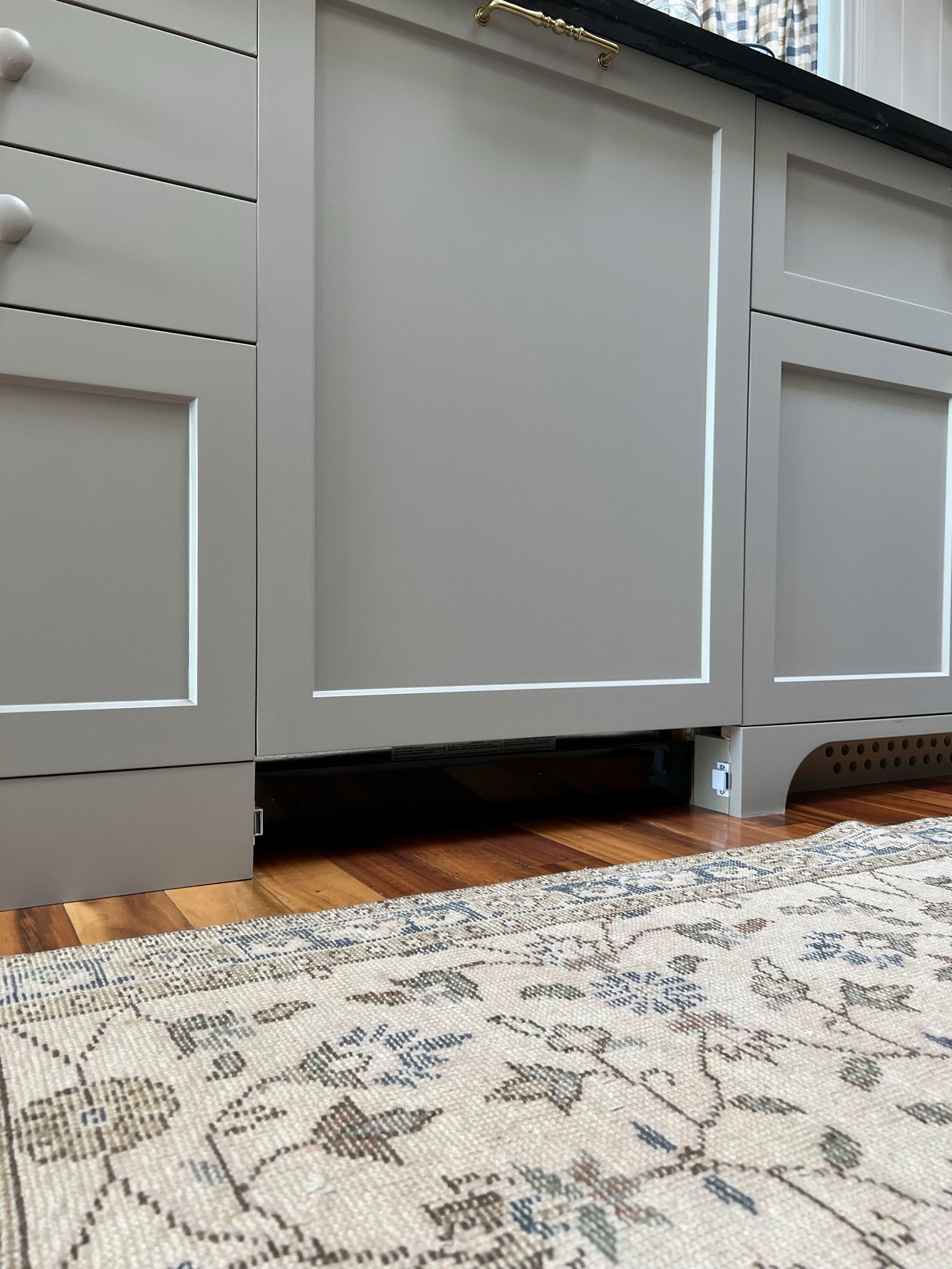 How to Add Decorative Toe Kicks to your Kitchen Cabinets - Jenna