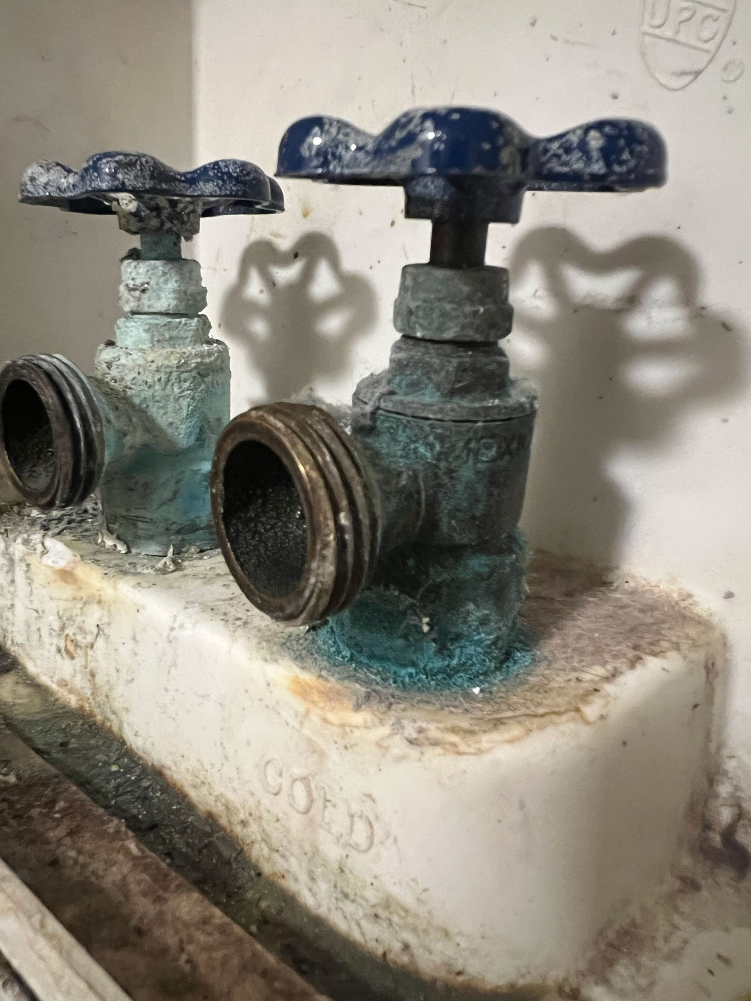 laundry taps with heavy corrosion