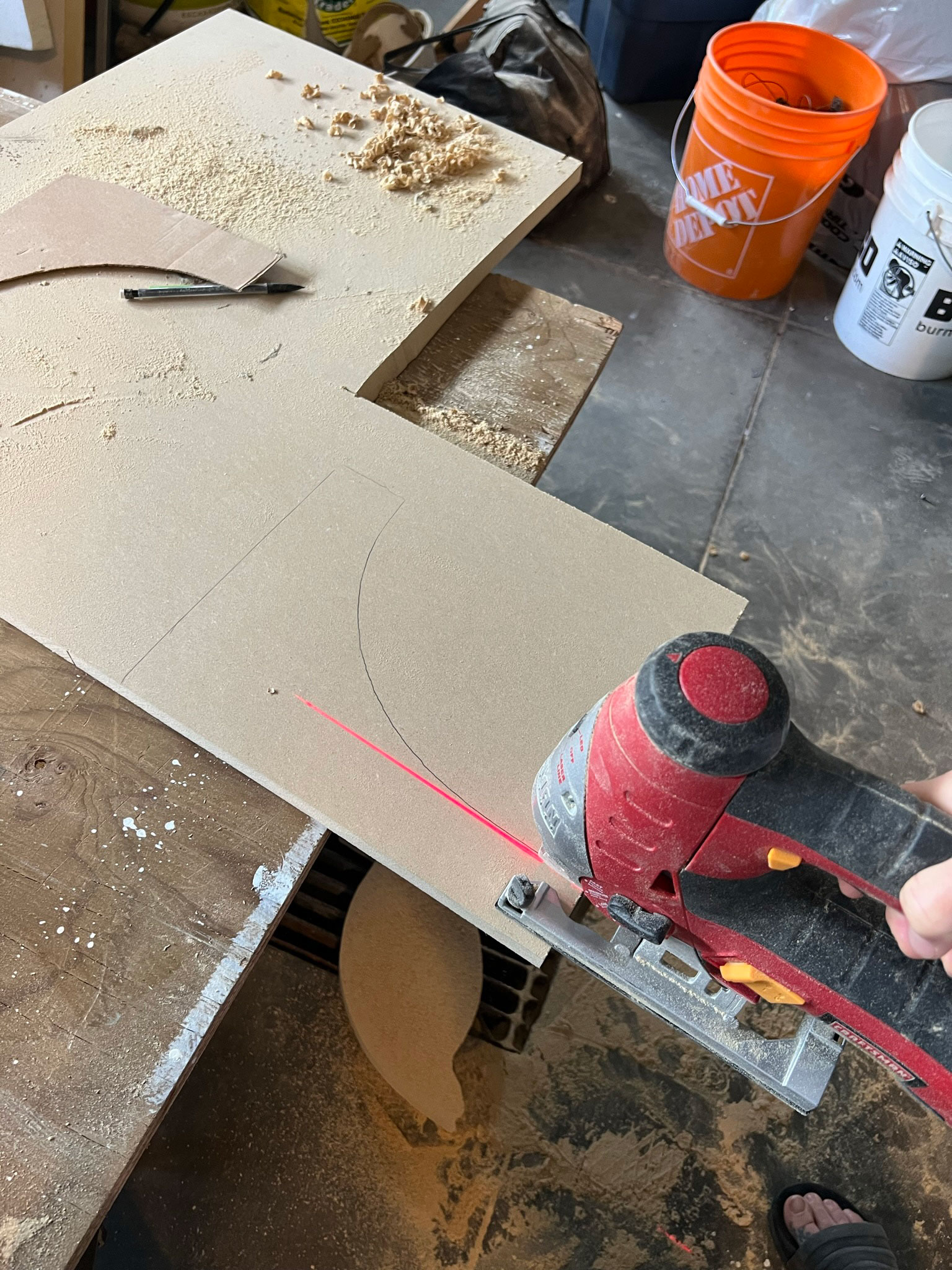 Using a jigsaw to cut out the shape on MDF