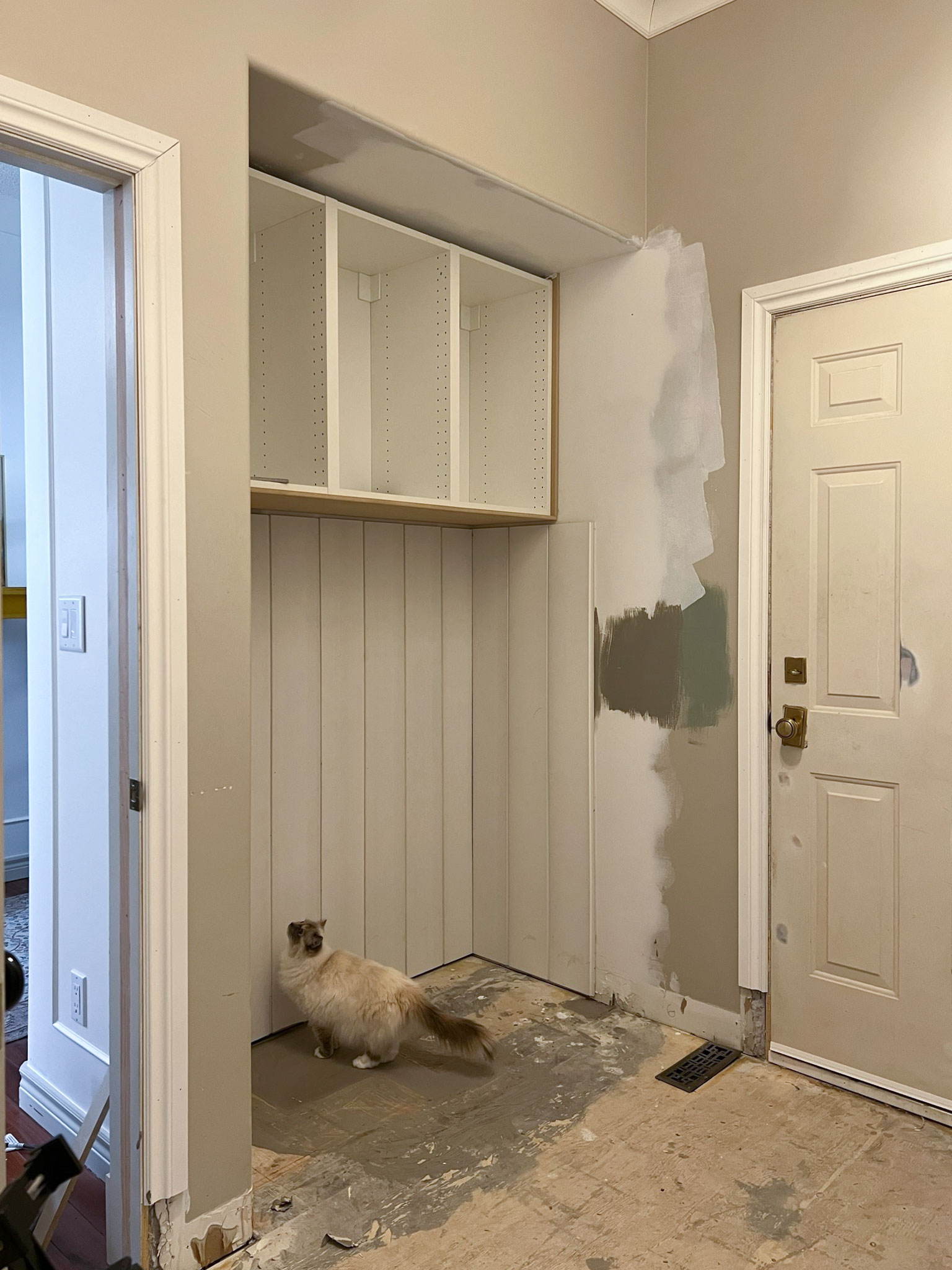 Upper cabinets in place and shiplap installed in alcove.  