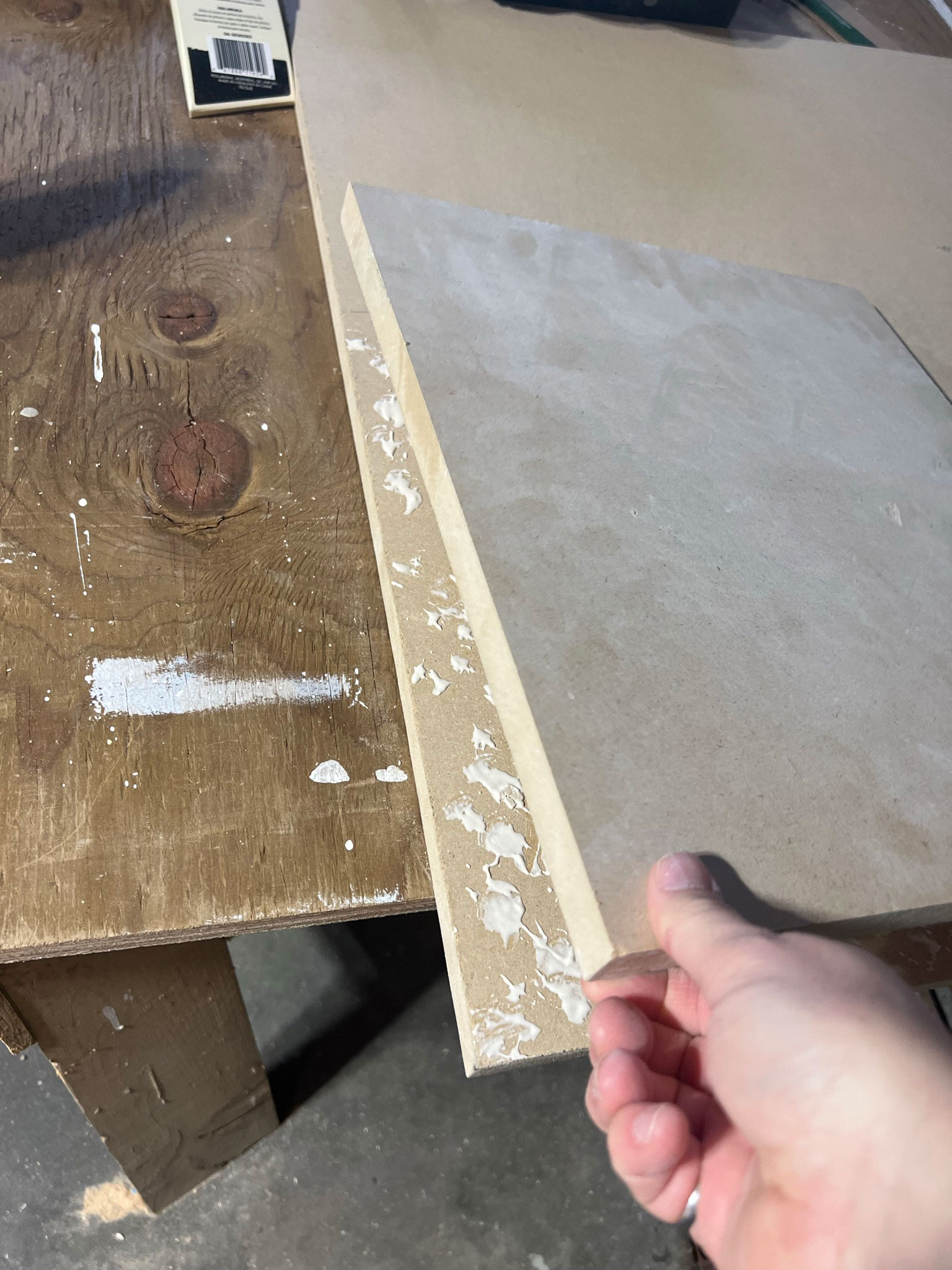adding a second piece of MDF to the glue on the first piece of MDF