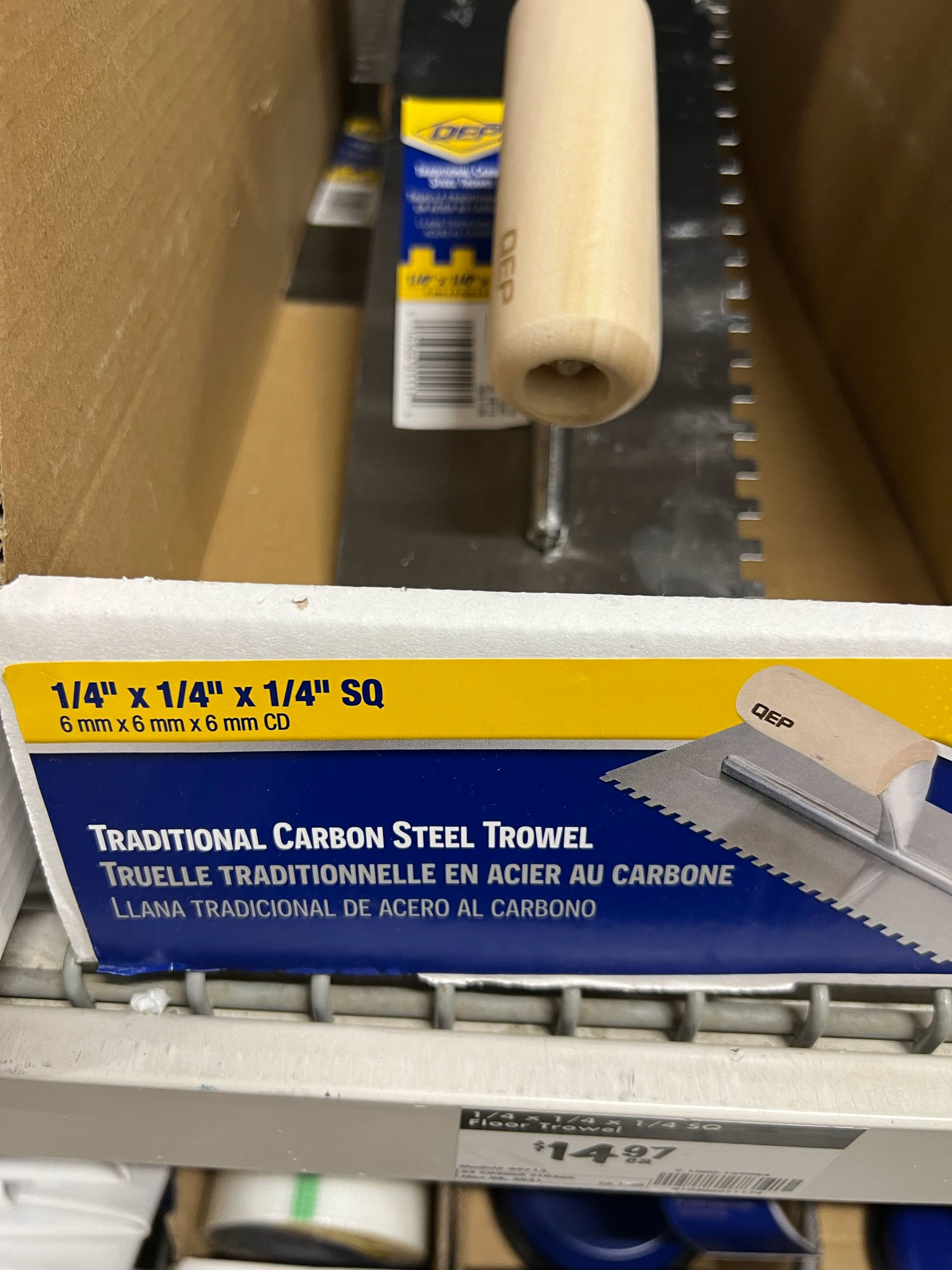 showing box where trowels are in the store with 1/4" size shown