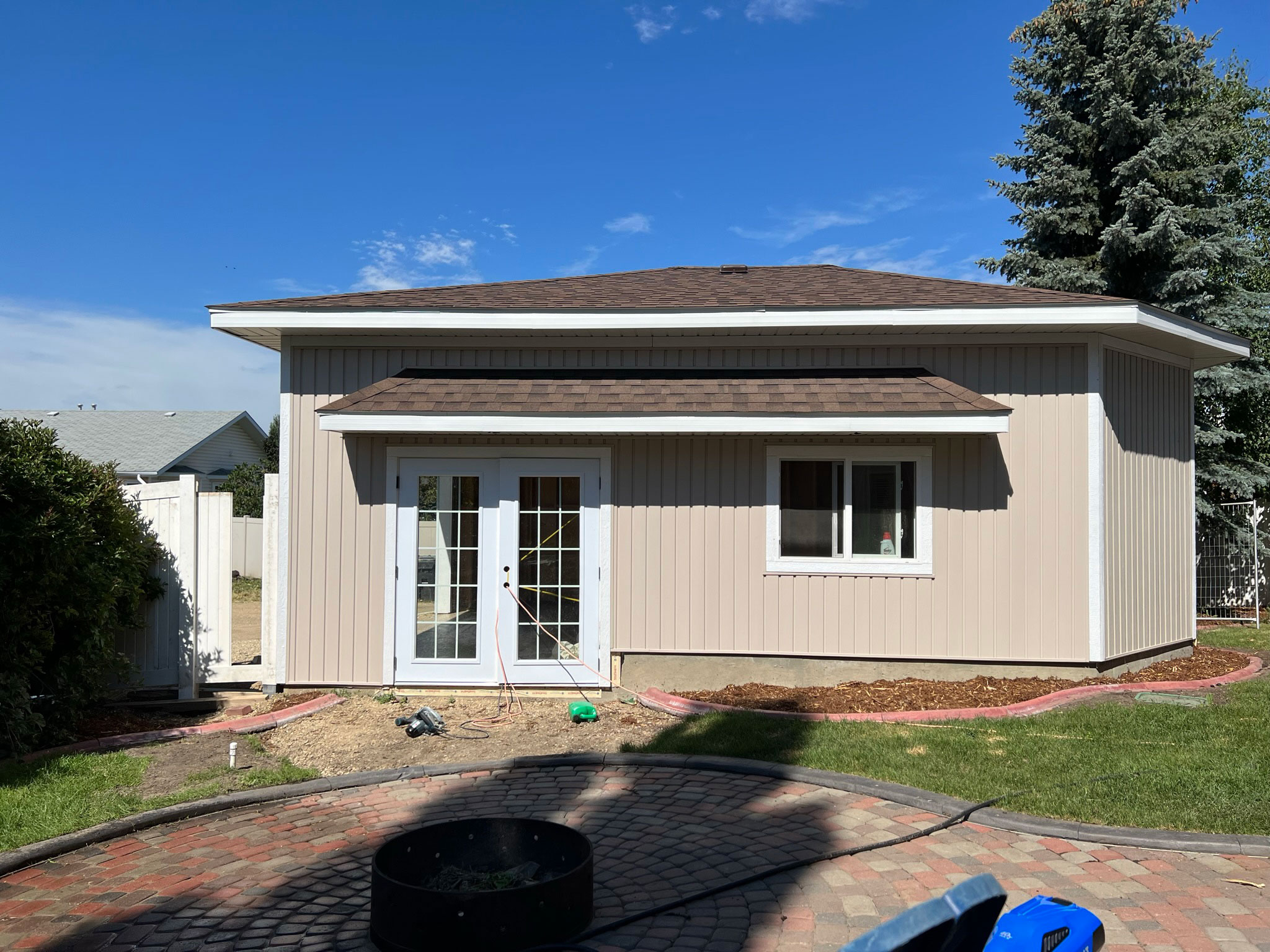 garage with window and double door