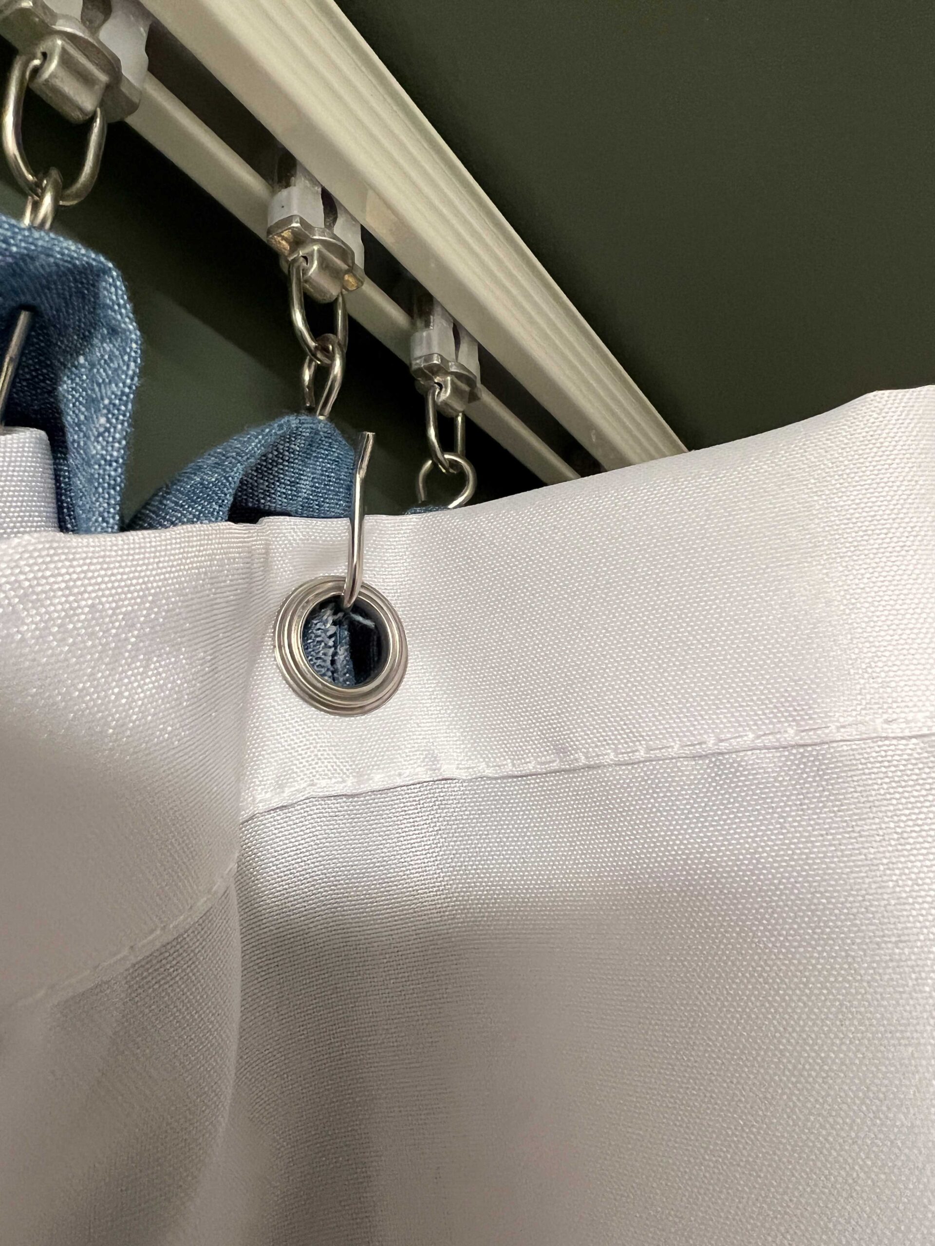 Using a Ceiling Curtain Track to Hang a Shower Curtain