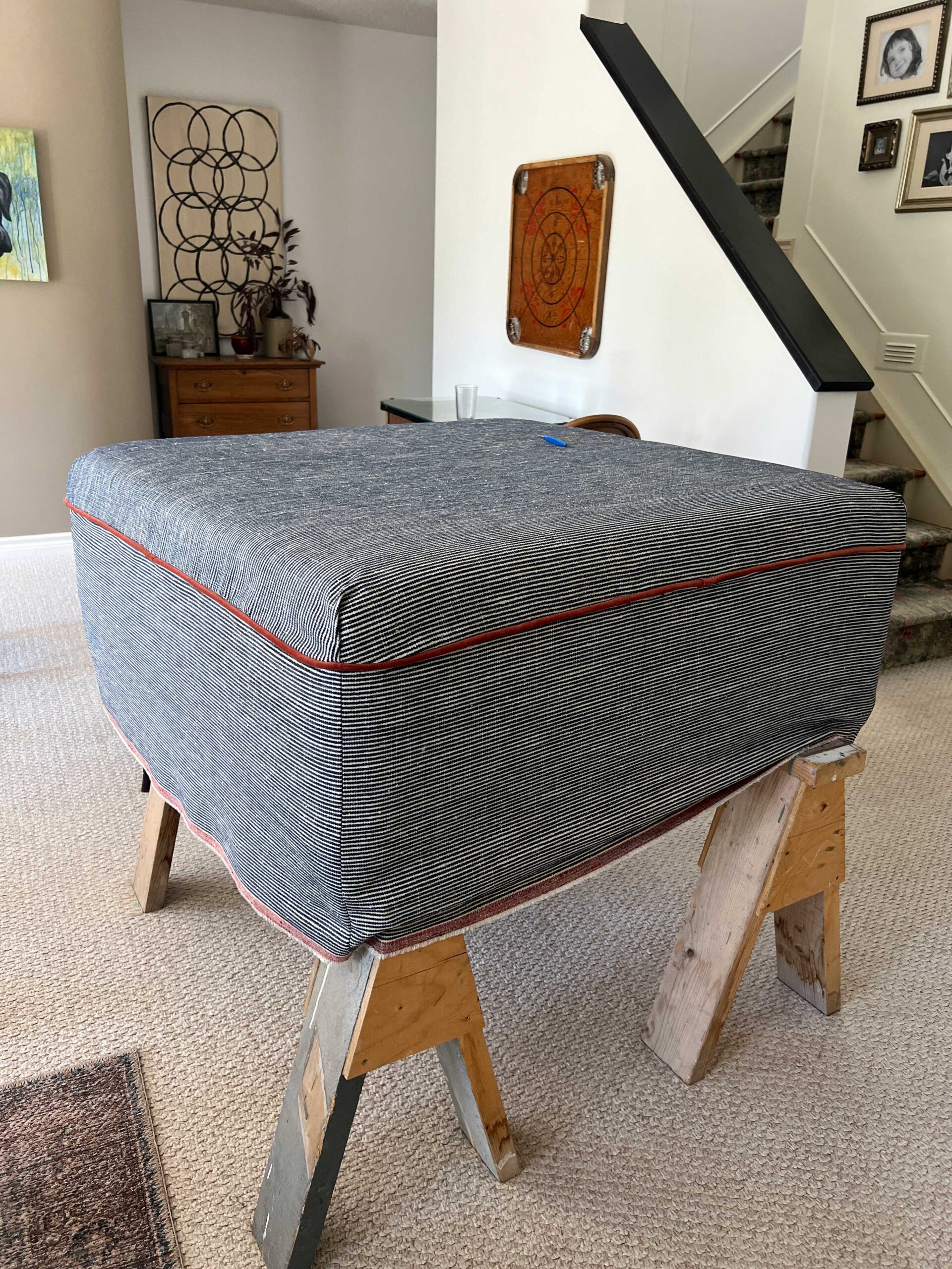 How to make a DIY upholstered ottoman footstool for $25!