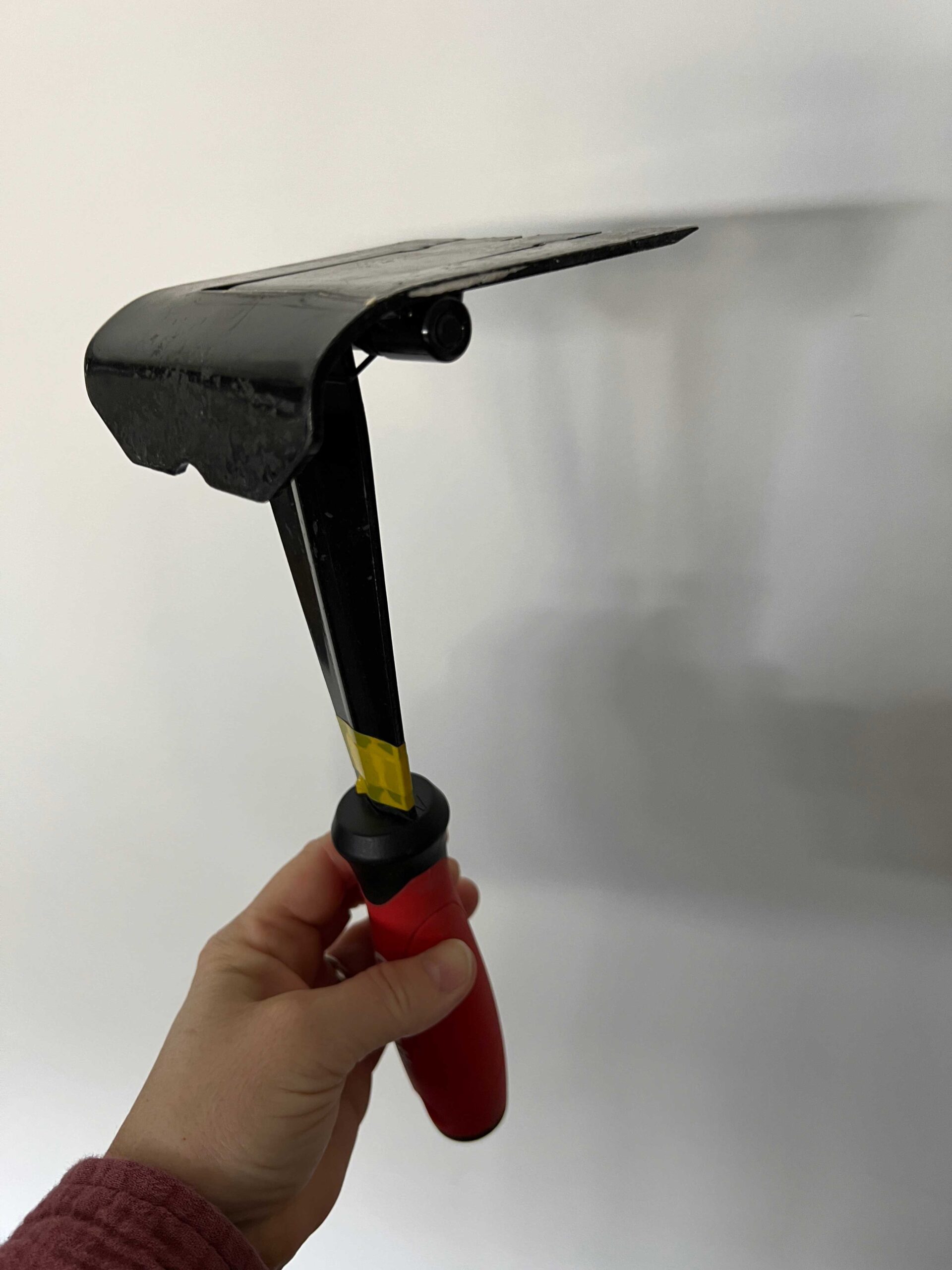 holding a trim pulling tool