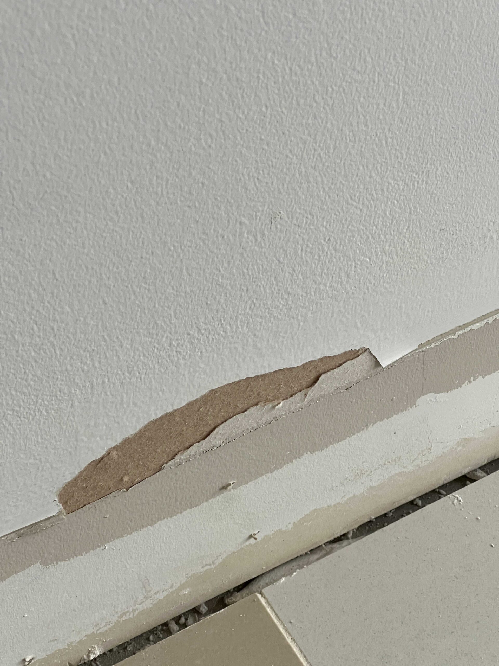 Paint removed from part of wall