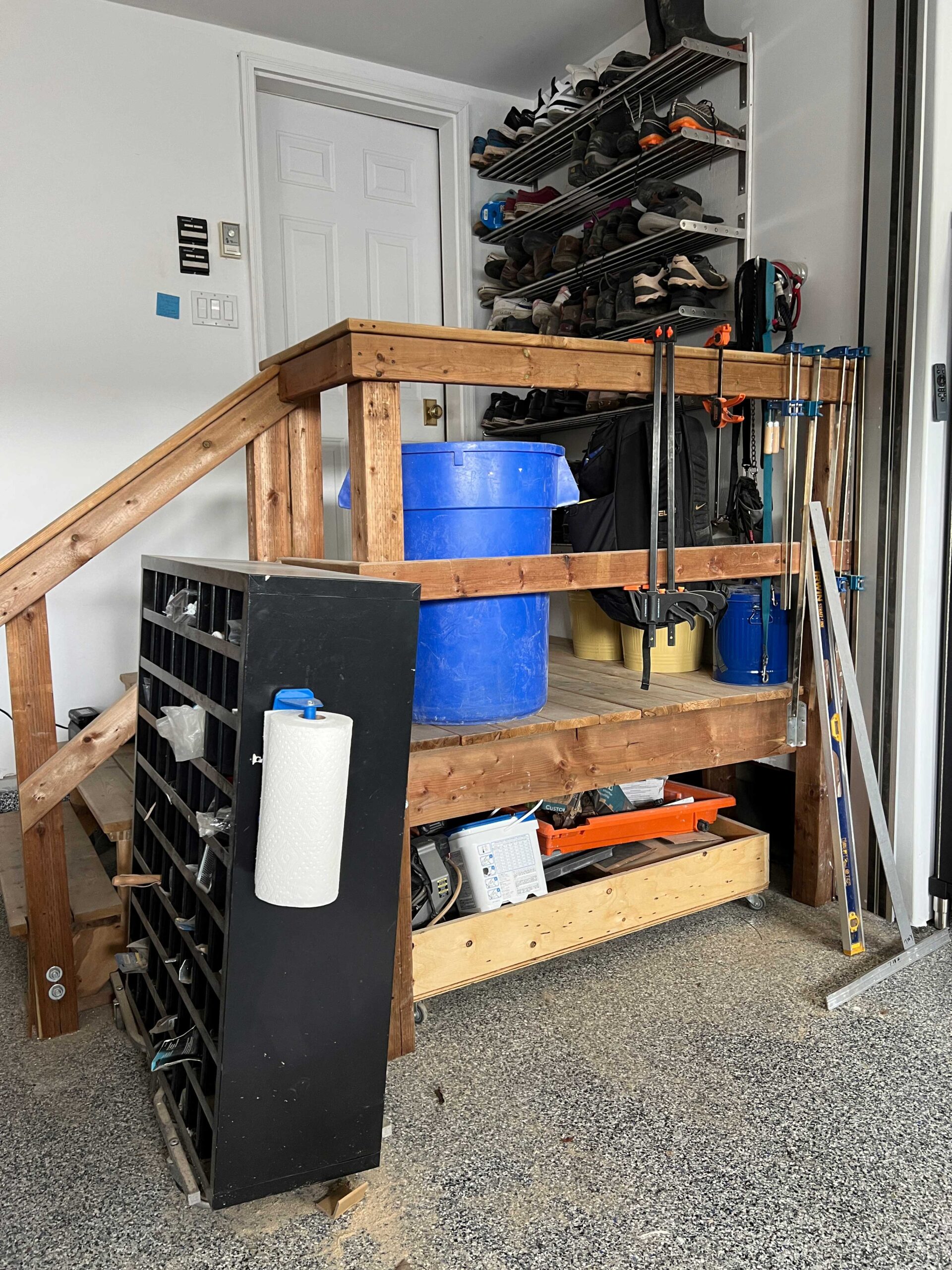 Garage steps with clutter on and below