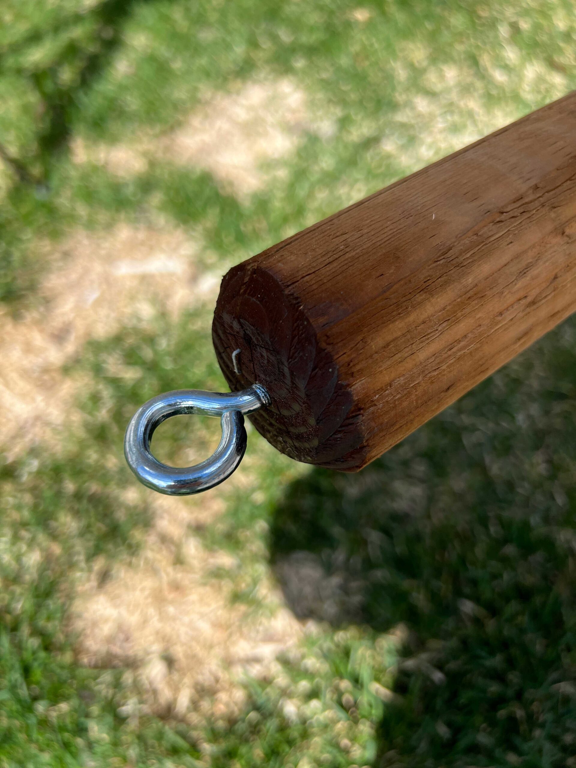 screw eye hook in top of string light pole