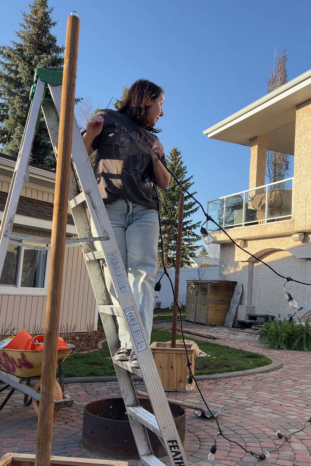 stringing lights up to string light poles