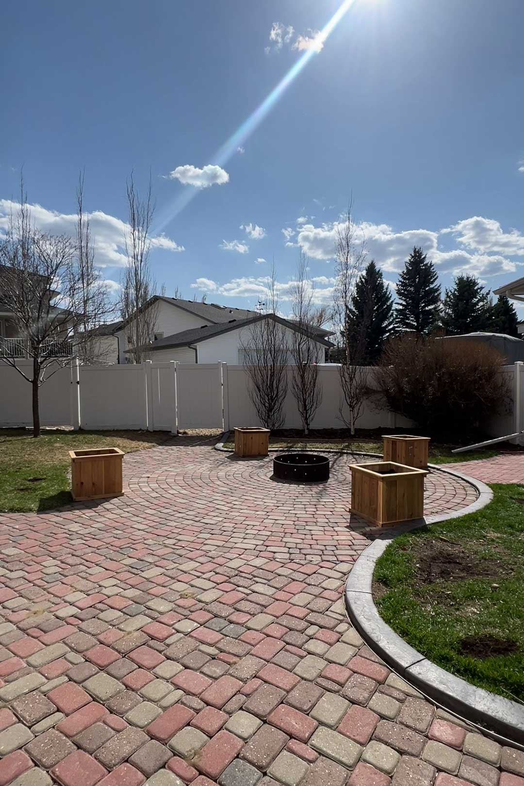 Planters sitting around a fire pit