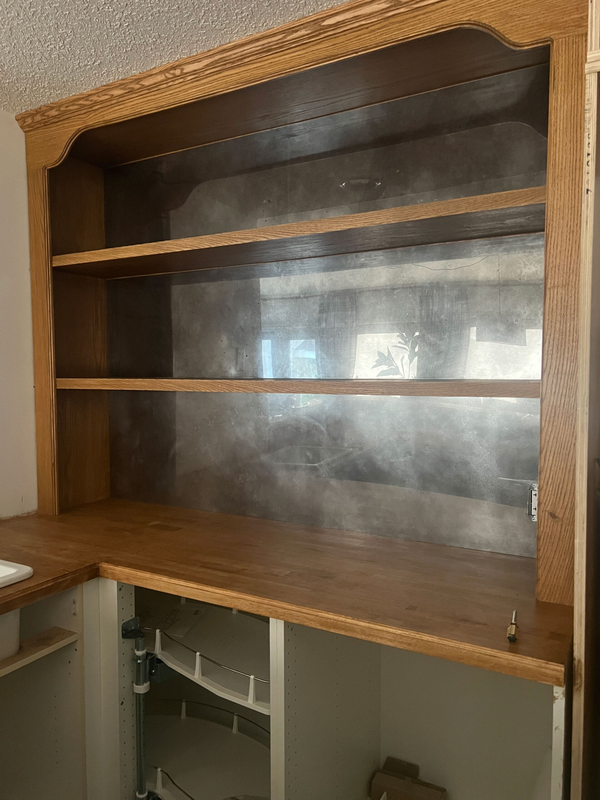 Finished hutch with antique mirror on the back