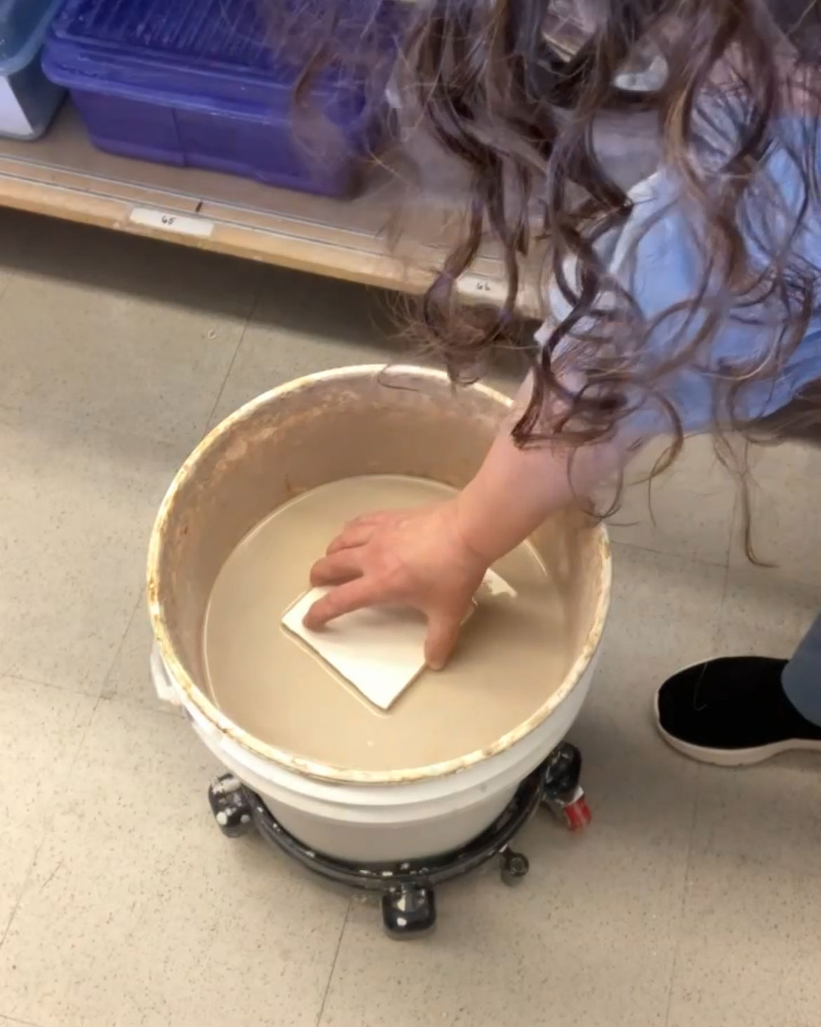 Dipping tile in glaze