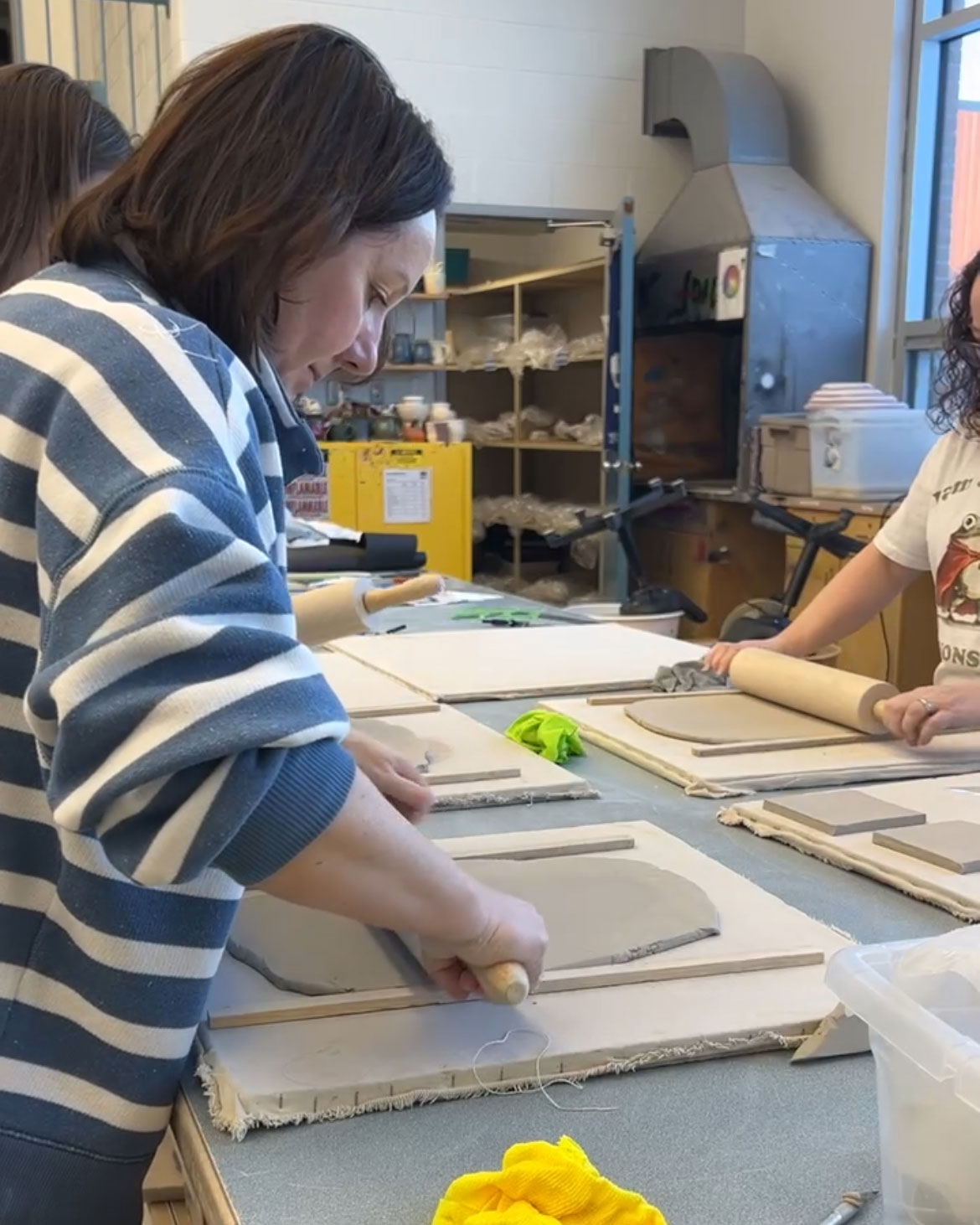 rolling out clay using roller strips