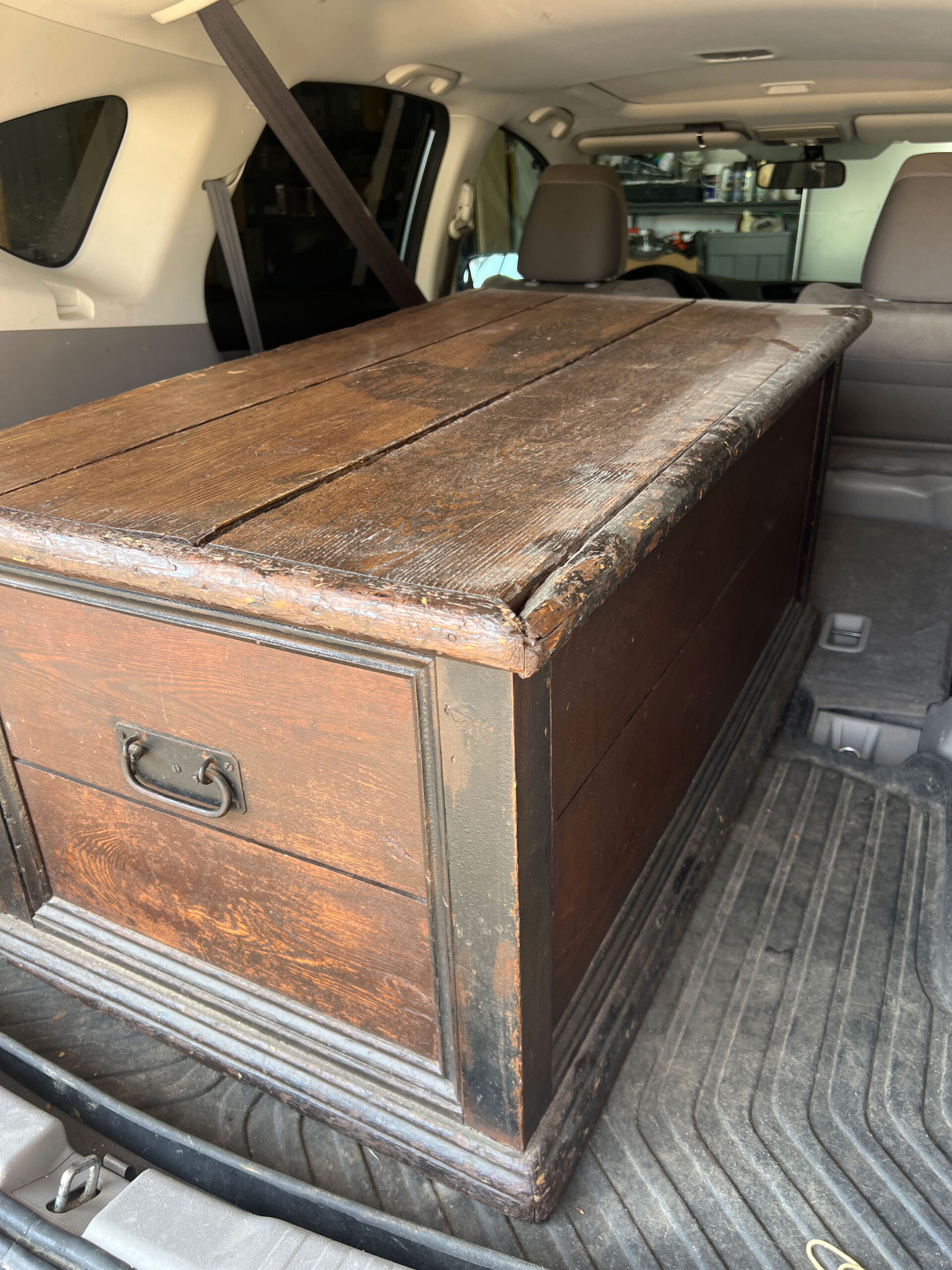Wood trunk in a car trunk