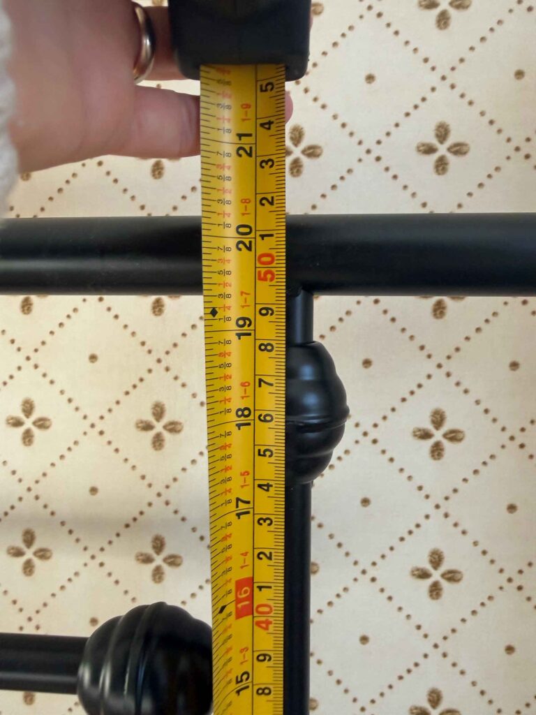 tape measure showing 20 inches measuring a bed