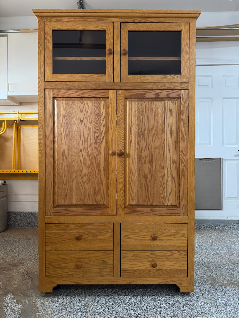 The armoire before the makeover, with the doors closed.