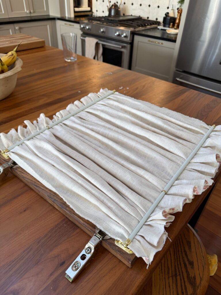 Adding a curtain on the back of the hutch door.