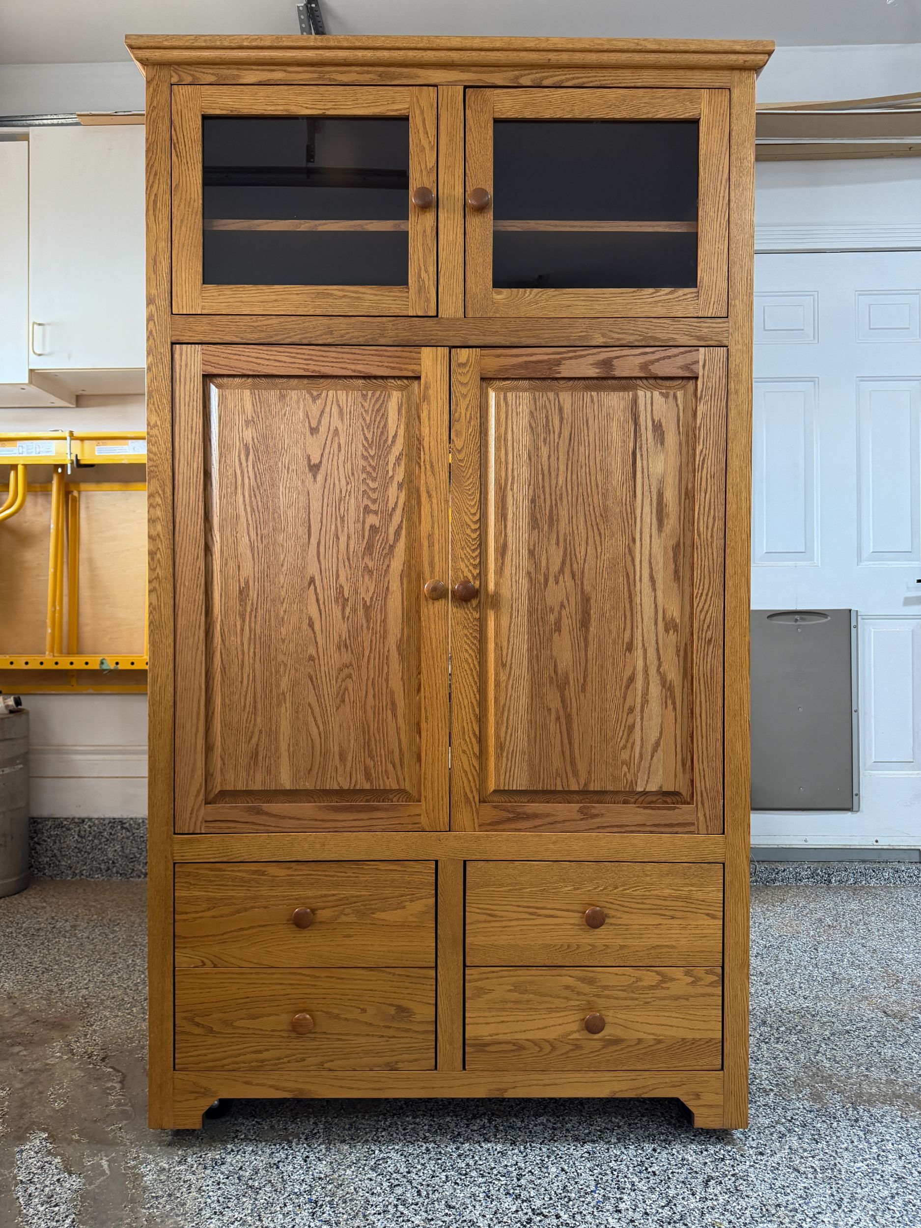 Front of solid oak TV armoire.