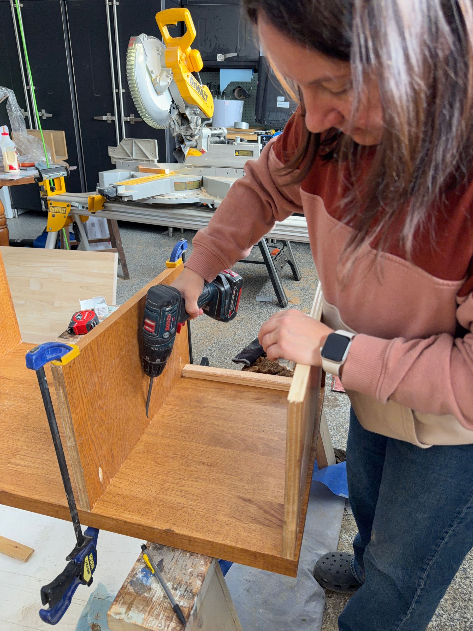 Making supports for the countertop from pieces of the old VCR shelf.