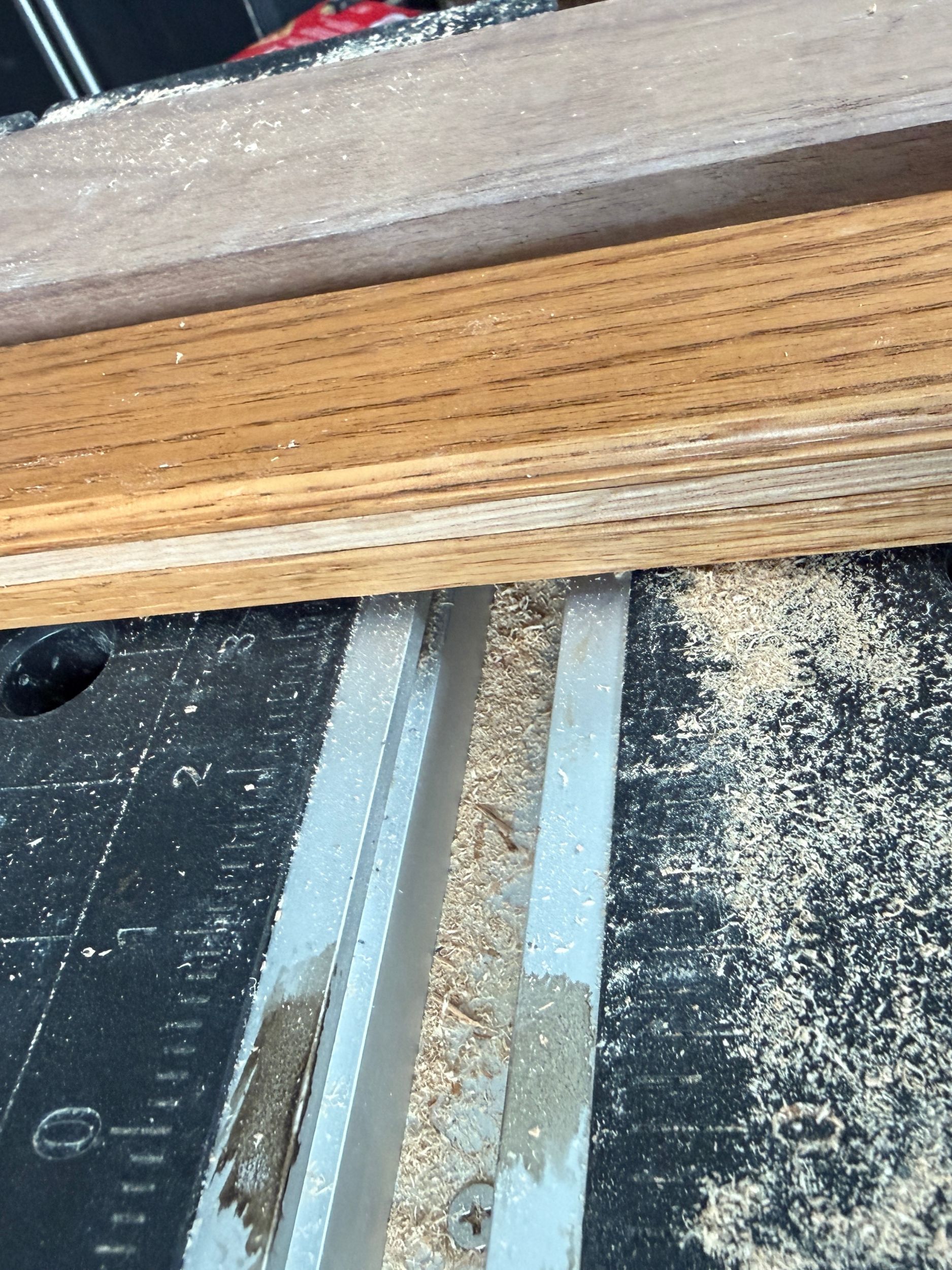 Cutting the back of the panel to level the groove.