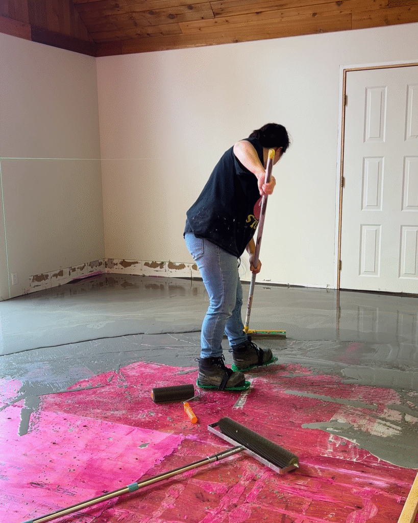 Spreading the self levelling concrete