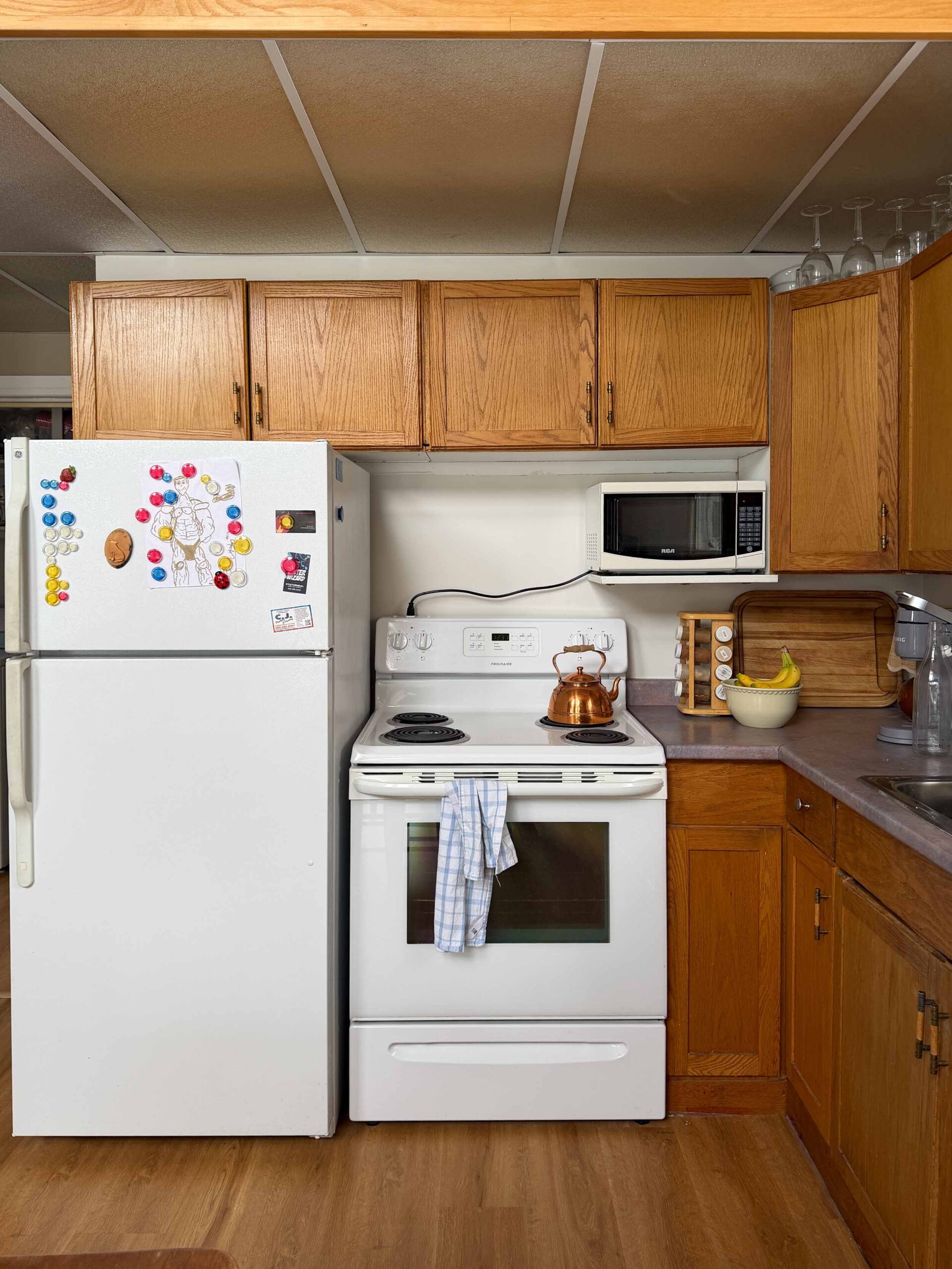 kitchen with wood cabinets,  wood ceiling
