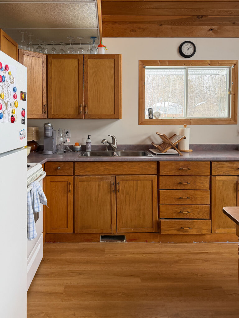 kitchen with wood cabinets, wood ceiling