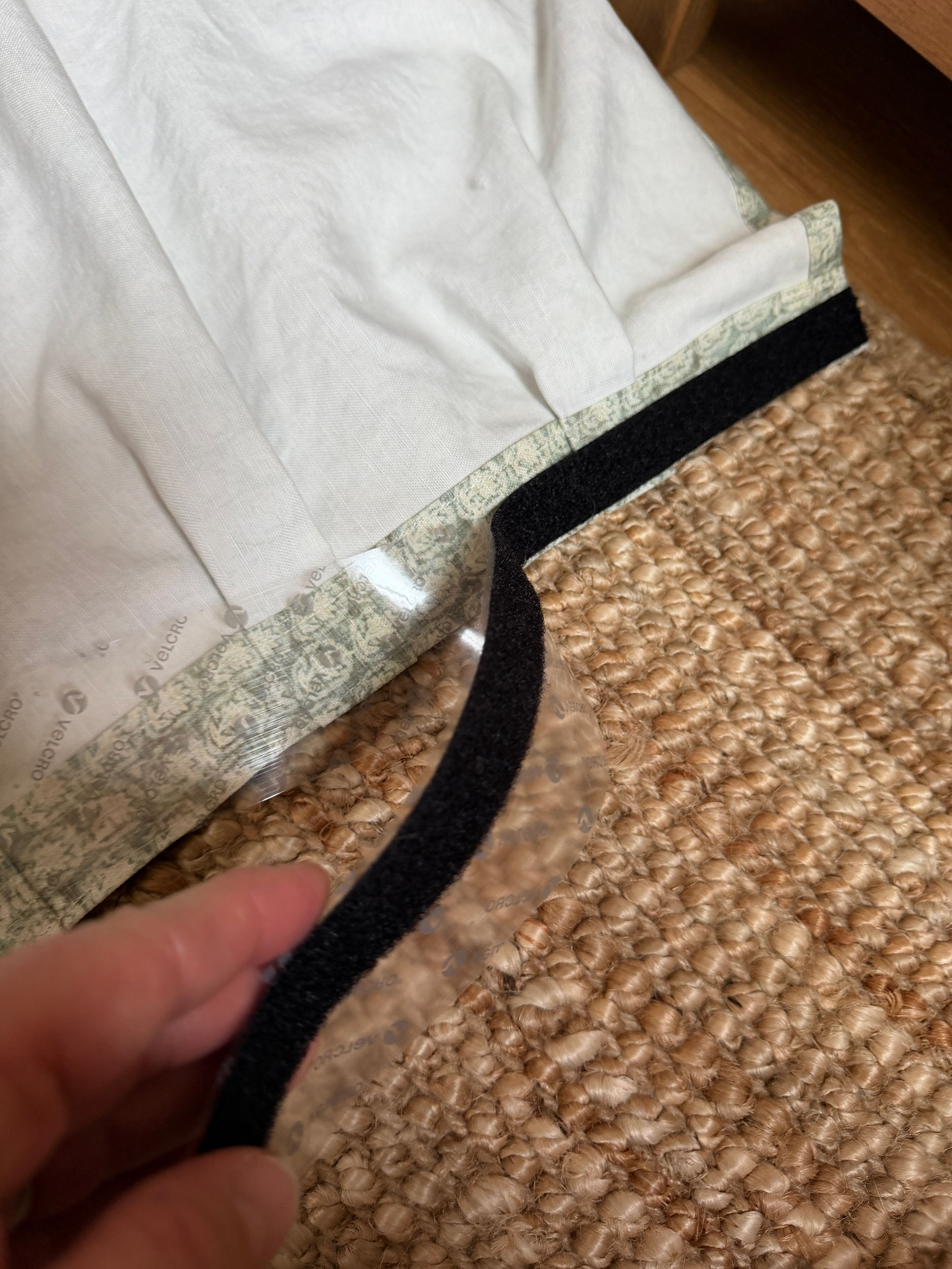 Attaching sticky velcro to the top of the diy bed skirt