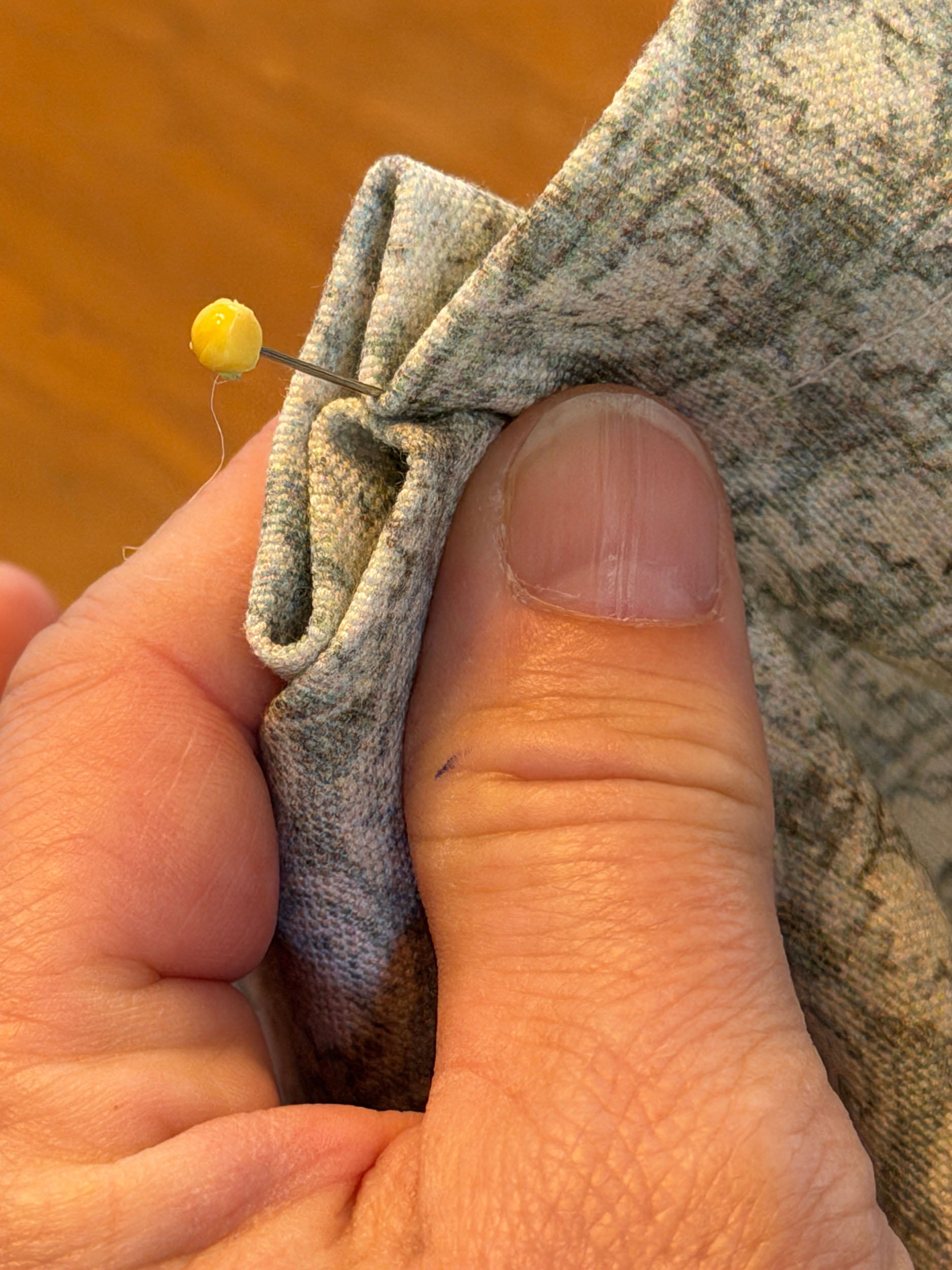 Holding a pleat in fabric
