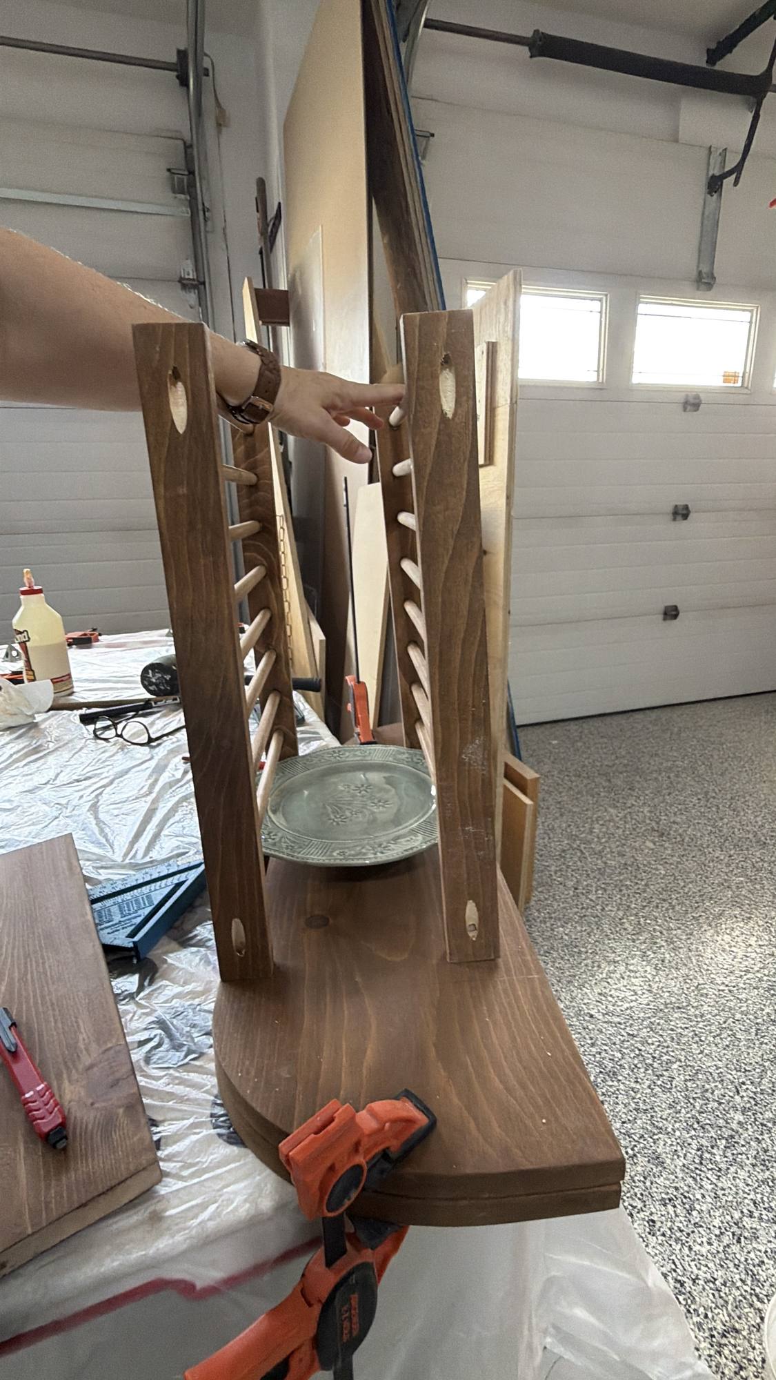 Holding plate rack before attaching it together