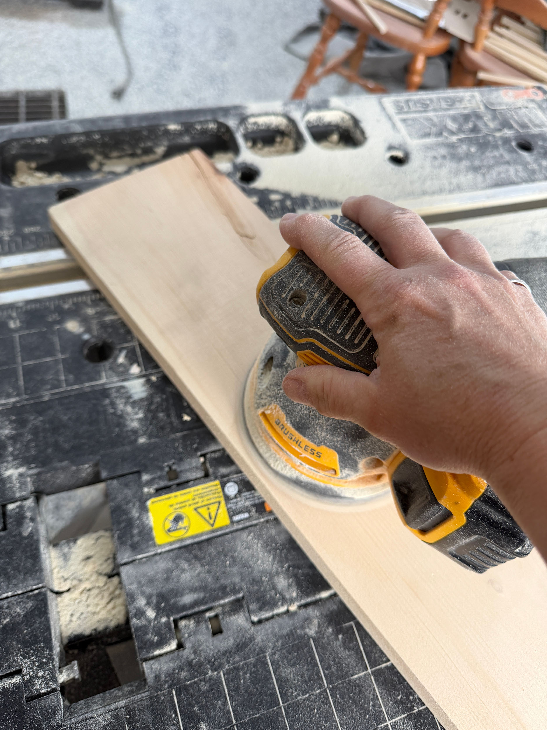 sanding wood with an orbital sander
